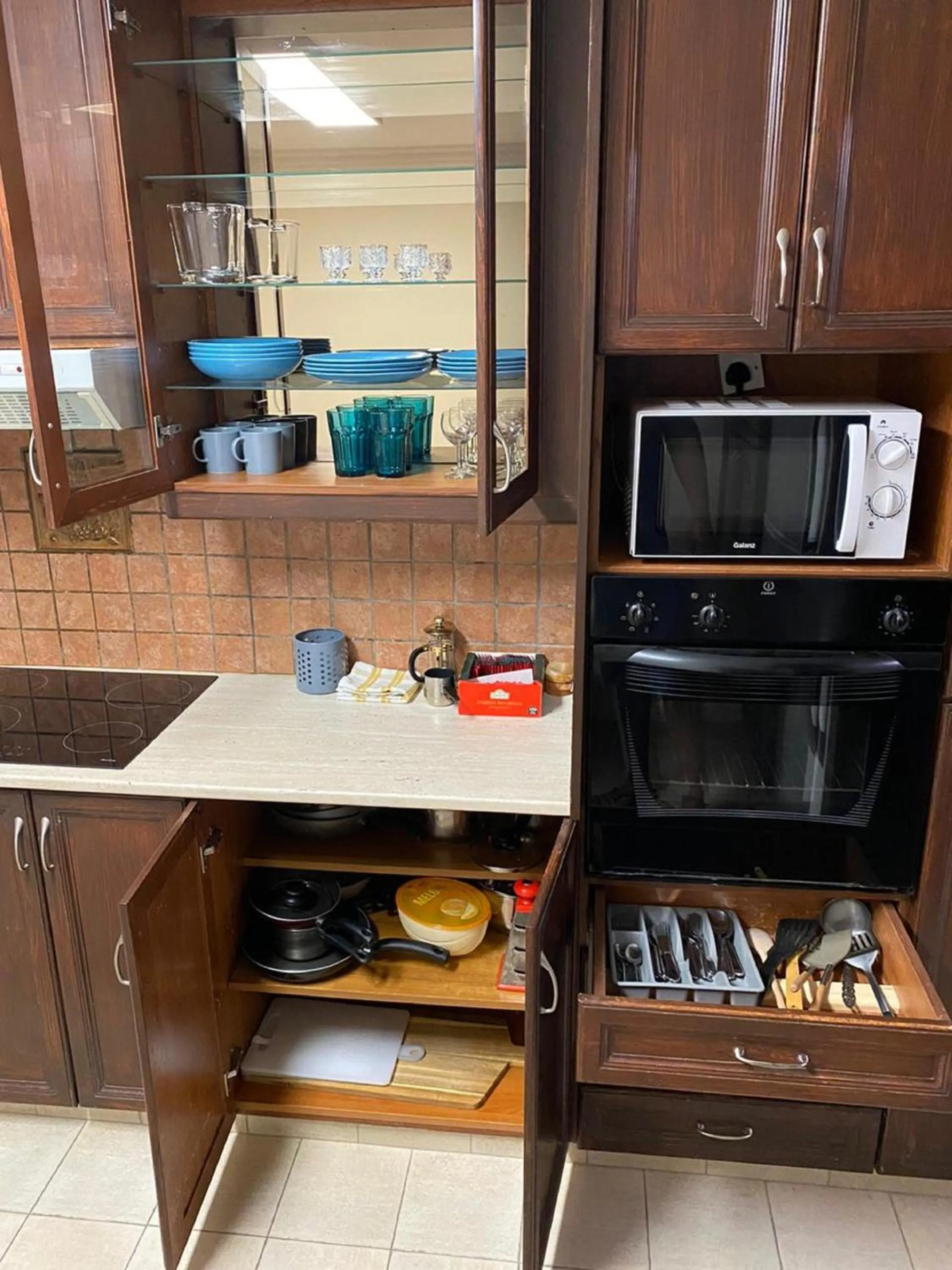 Kitchen or kitchenette in City Comfort Rooms