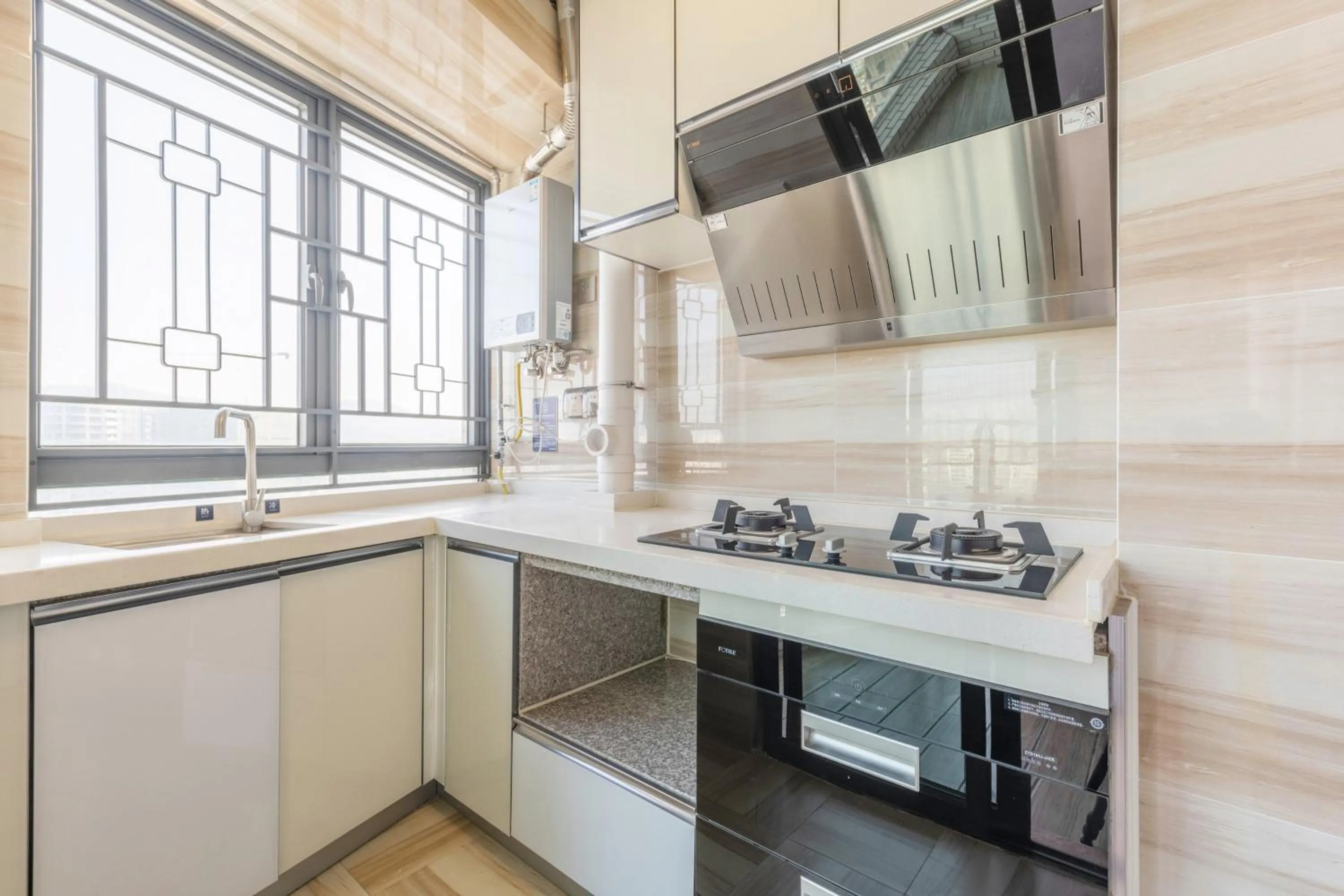 Kitchen or kitchenette in Dingshang Apartment Hotel