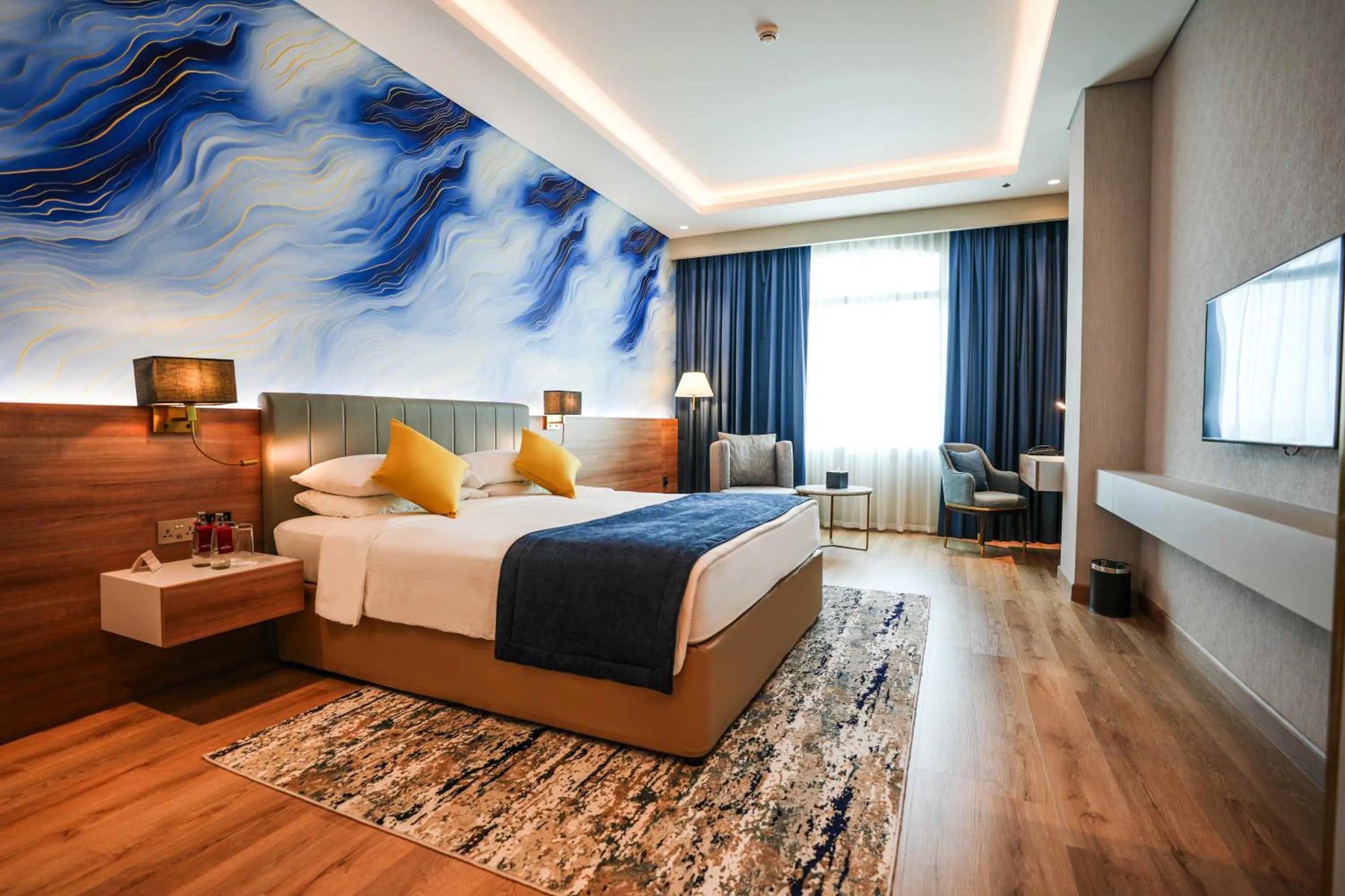 Bedroom, Bed in Mövenpick Grand Al Bustan