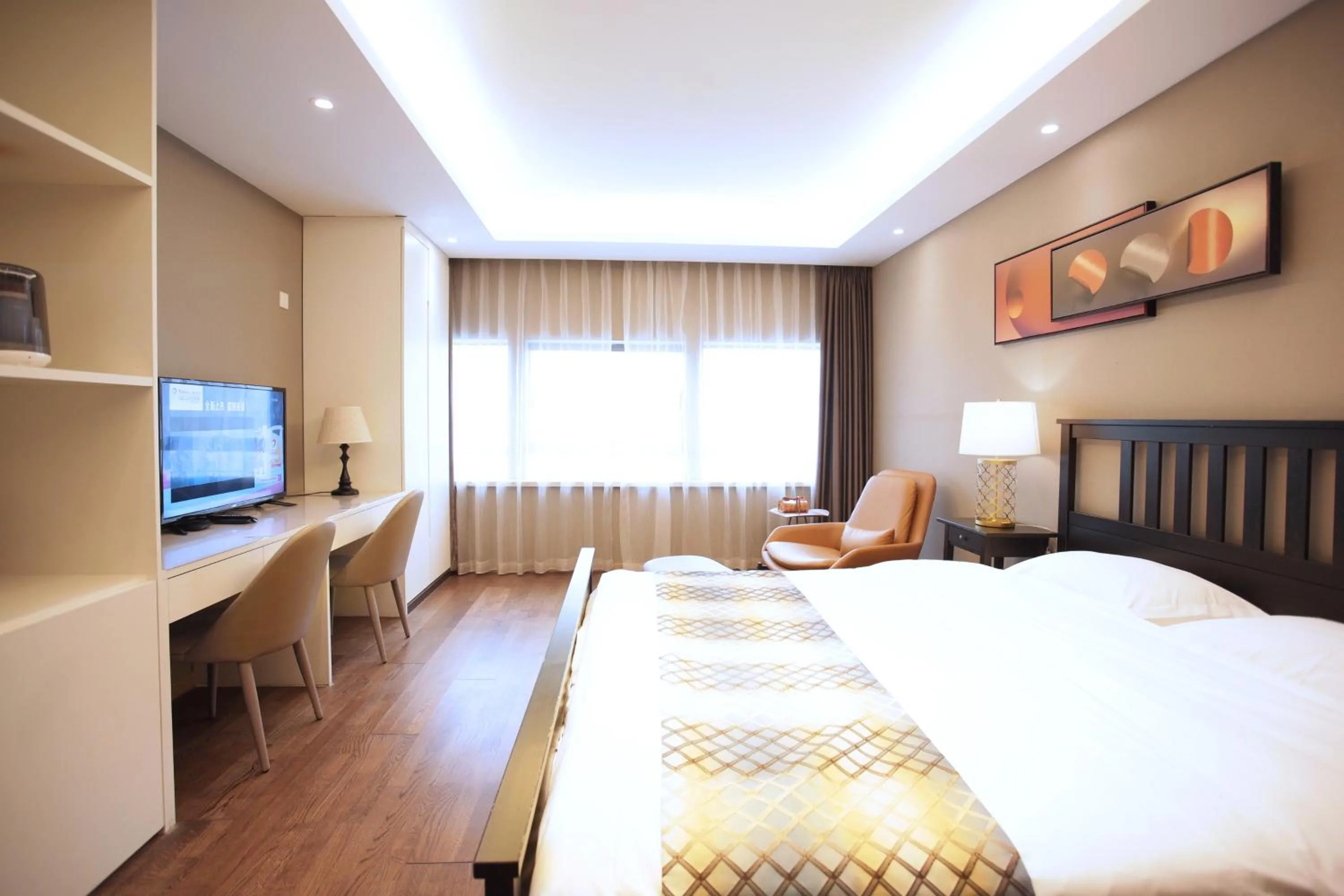 Bed in Yashi International Aparthotel