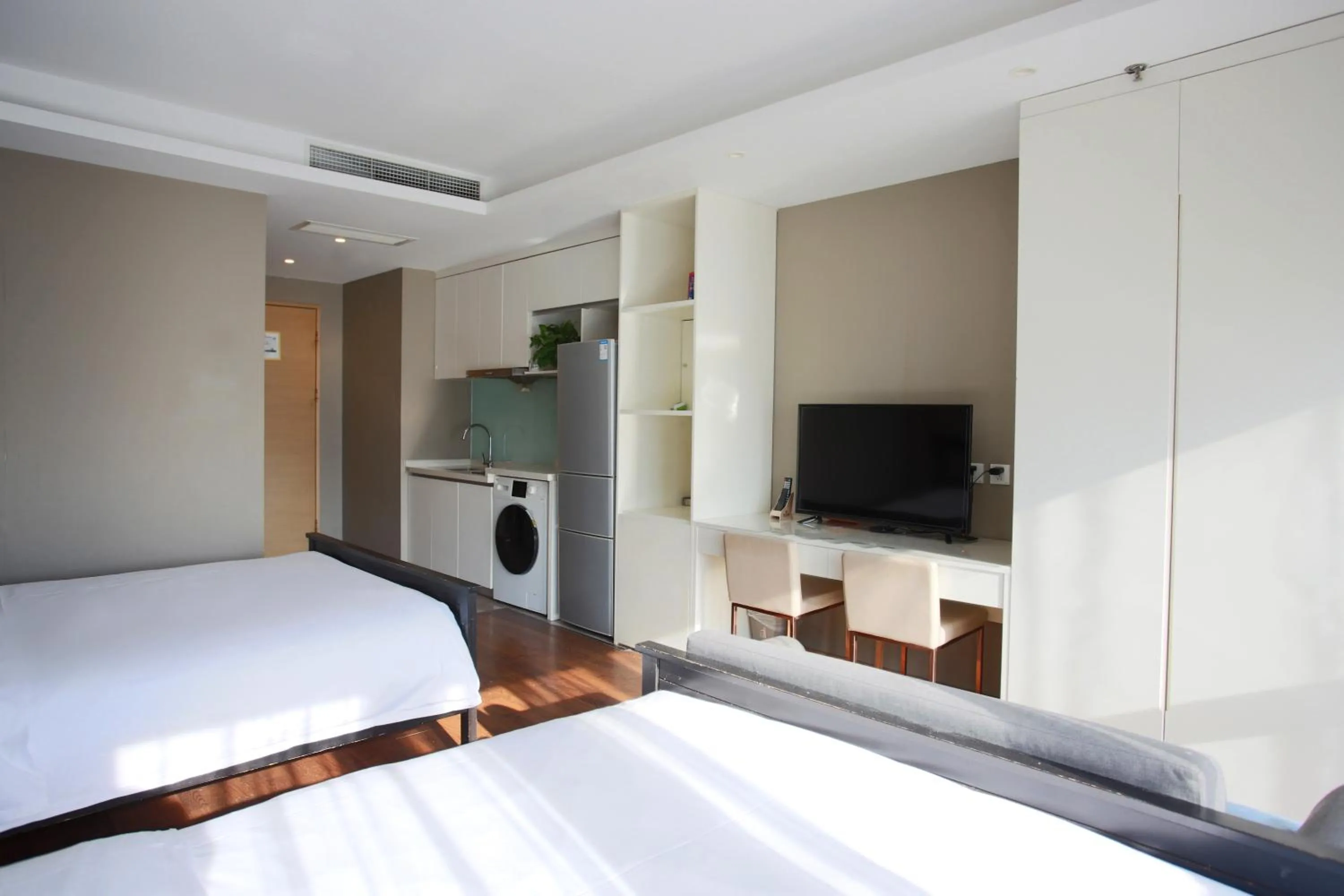 Bed in Yashi International Aparthotel