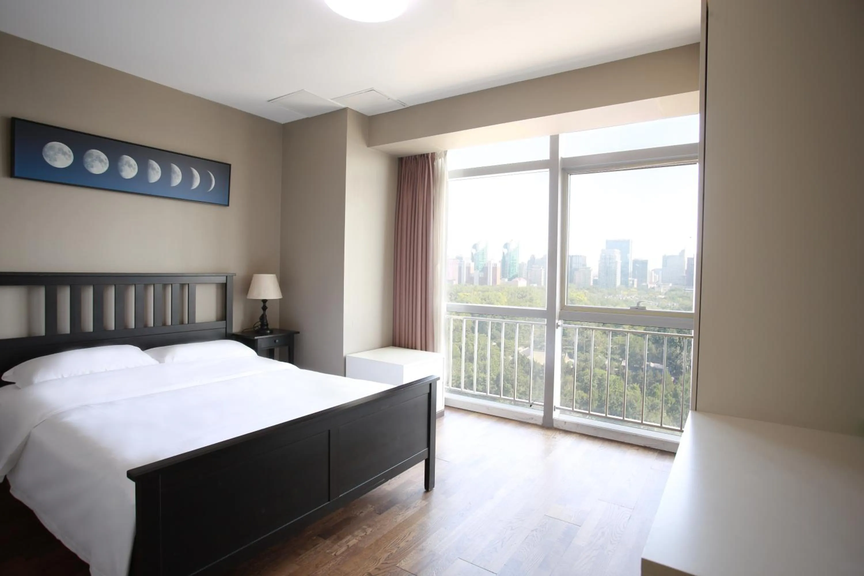 Bed in Yashi International Aparthotel