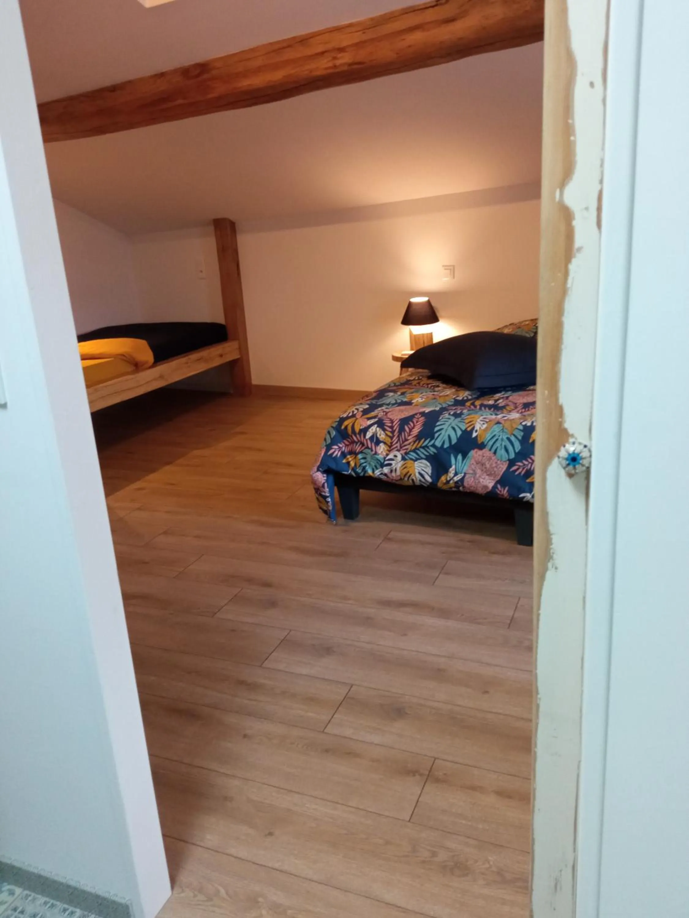 Bed in Le Tamaris Chambres d'hôtes