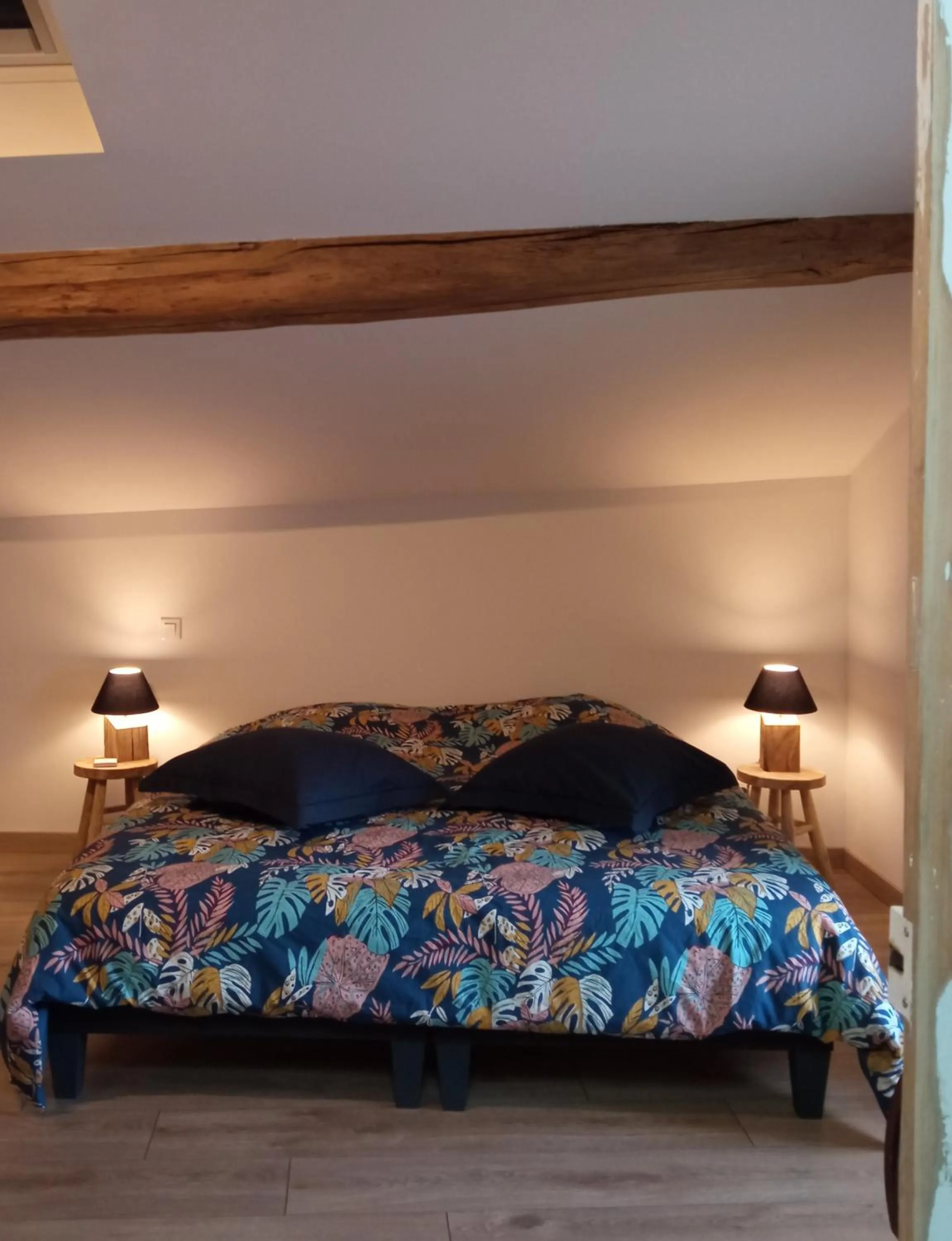 Bed in Le Tamaris Chambres d'hôtes