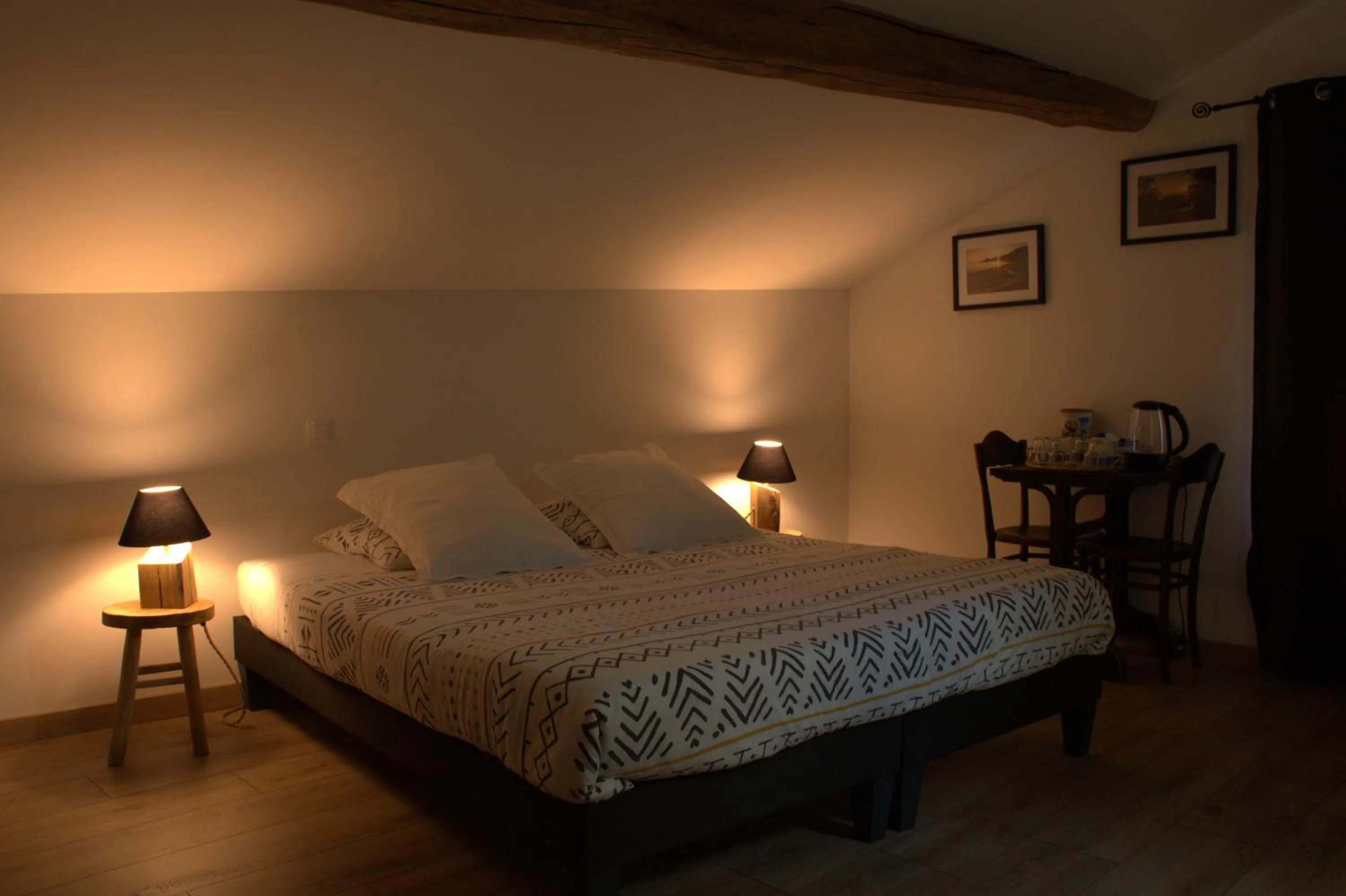 Bed in Le Tamaris Chambres d'hôtes