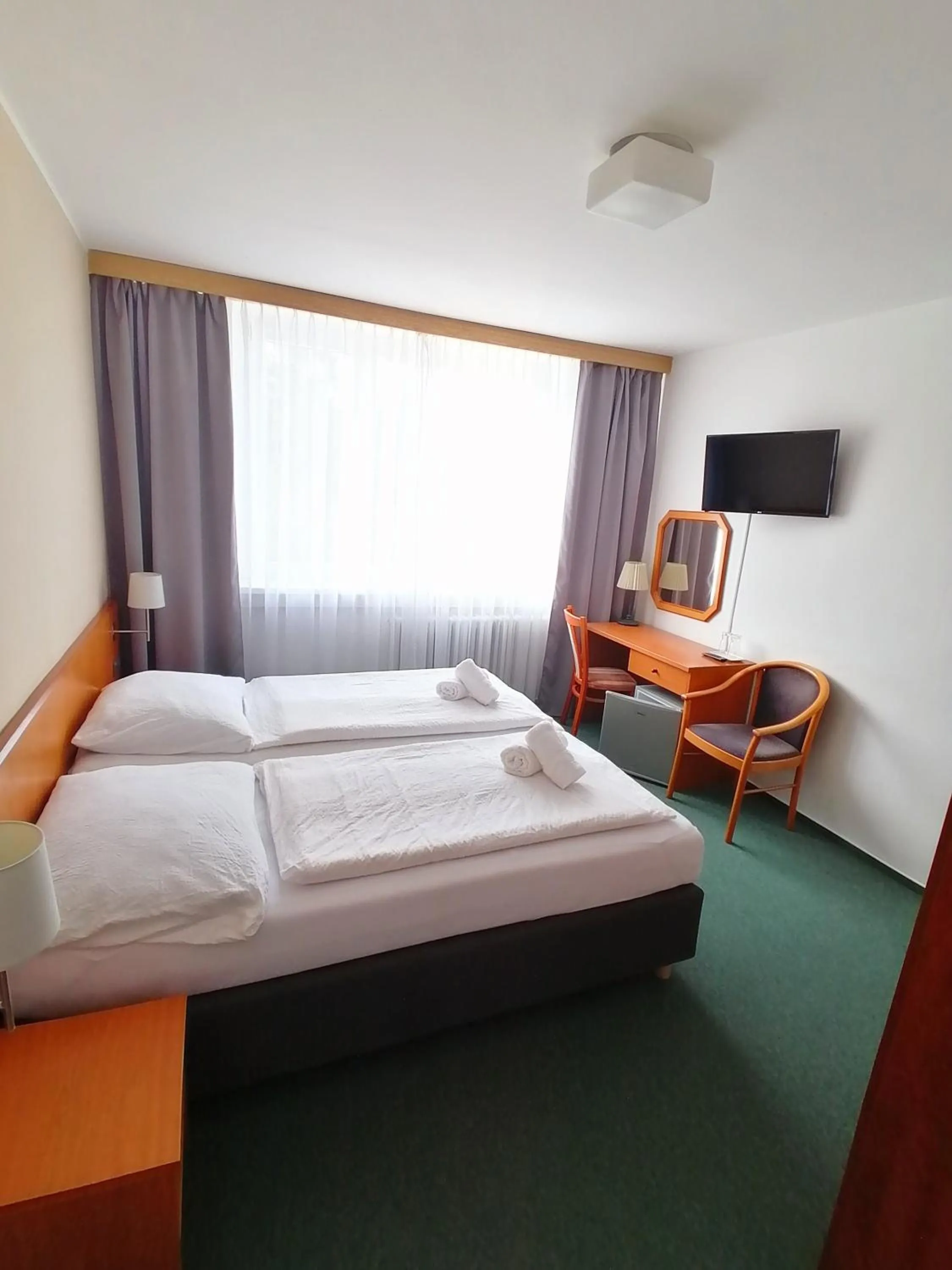 Bed in Horský hotel Jelenovská s bazénem v ceně