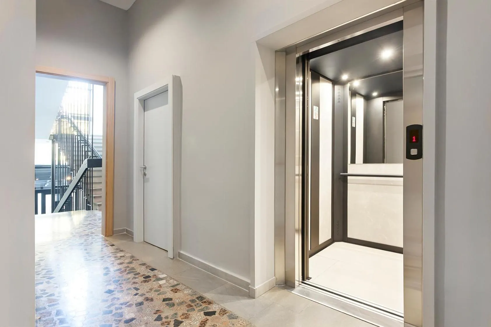 Property building in Kombinat Rooms City Center