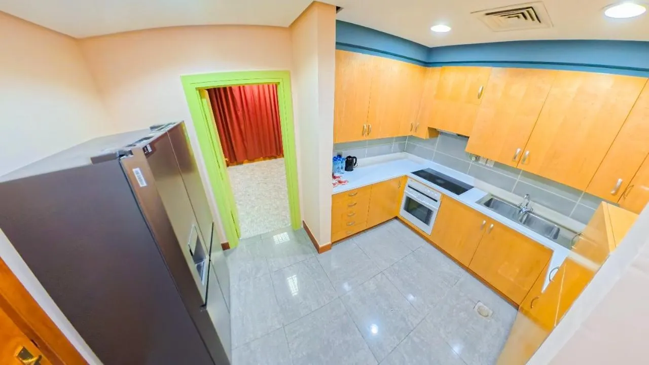 Kitchen or kitchenette in Oryx Grand Hotel Jebel Hafeet