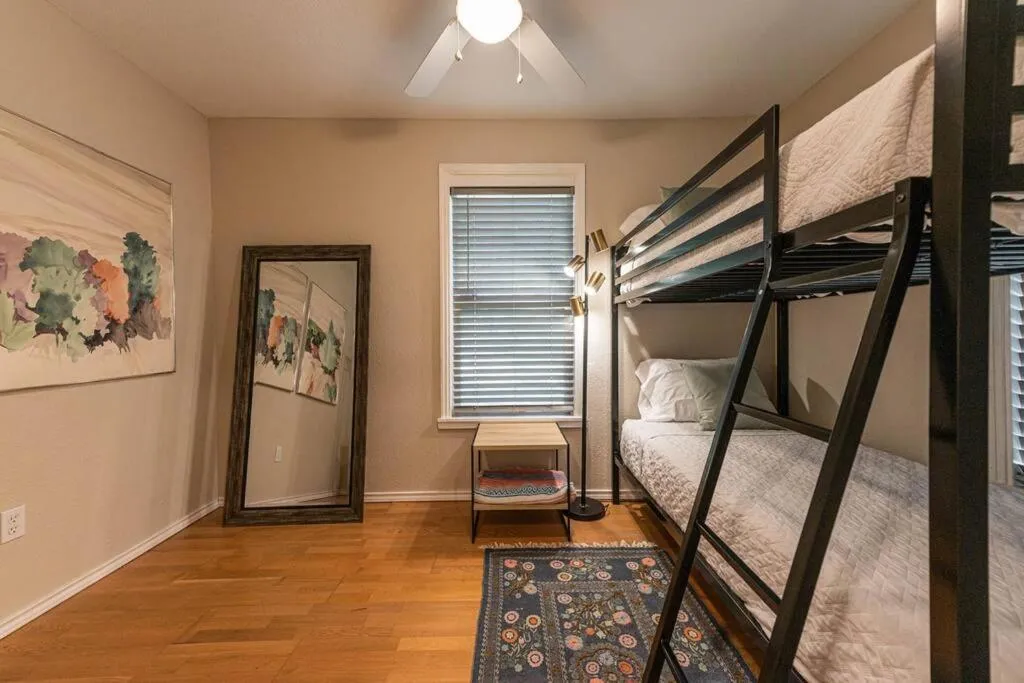 Bed in Escape to a Restored 1920s East Waco Bungalow