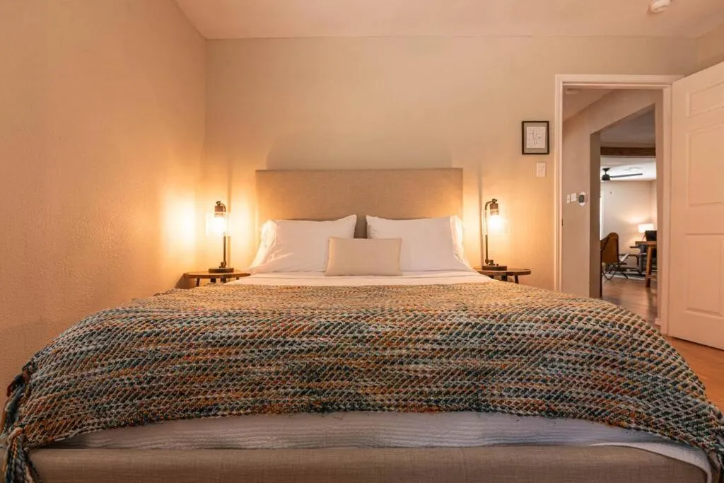 Bed in Escape to a Restored 1920s East Waco Bungalow