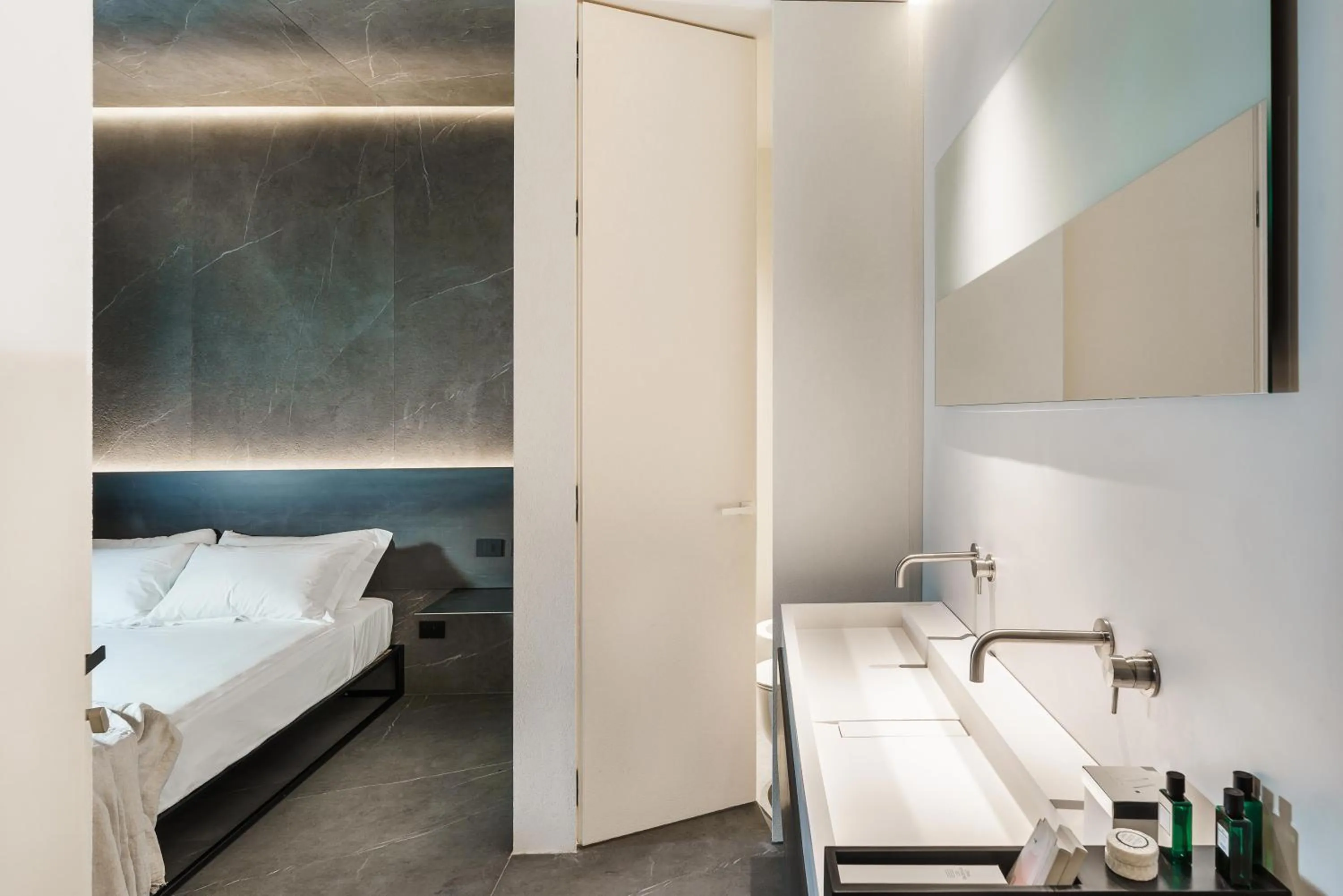Property building, Bed in Meo Design Suites & Spa