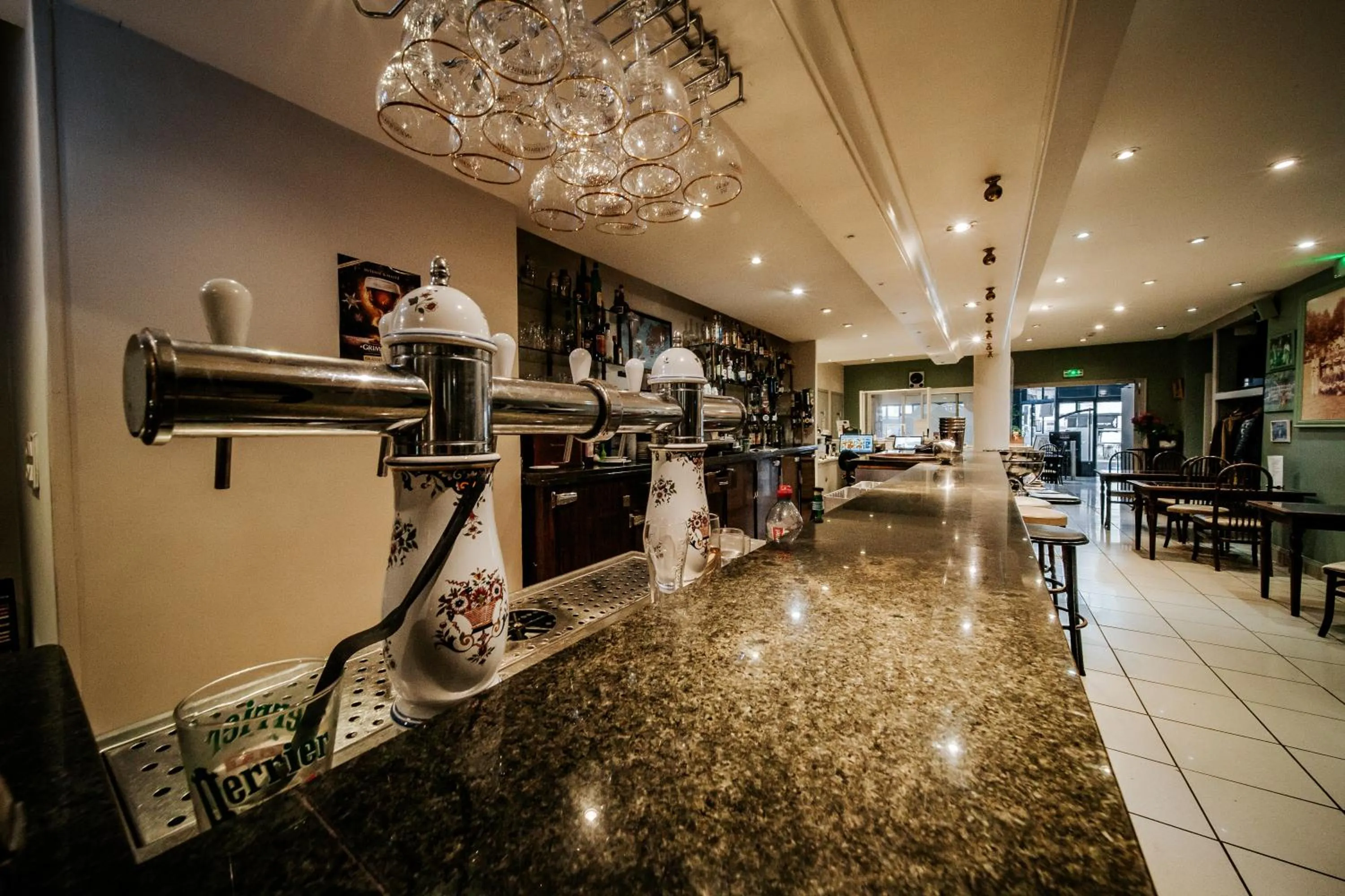 Lounge or bar in Hôtel Le Tivoli