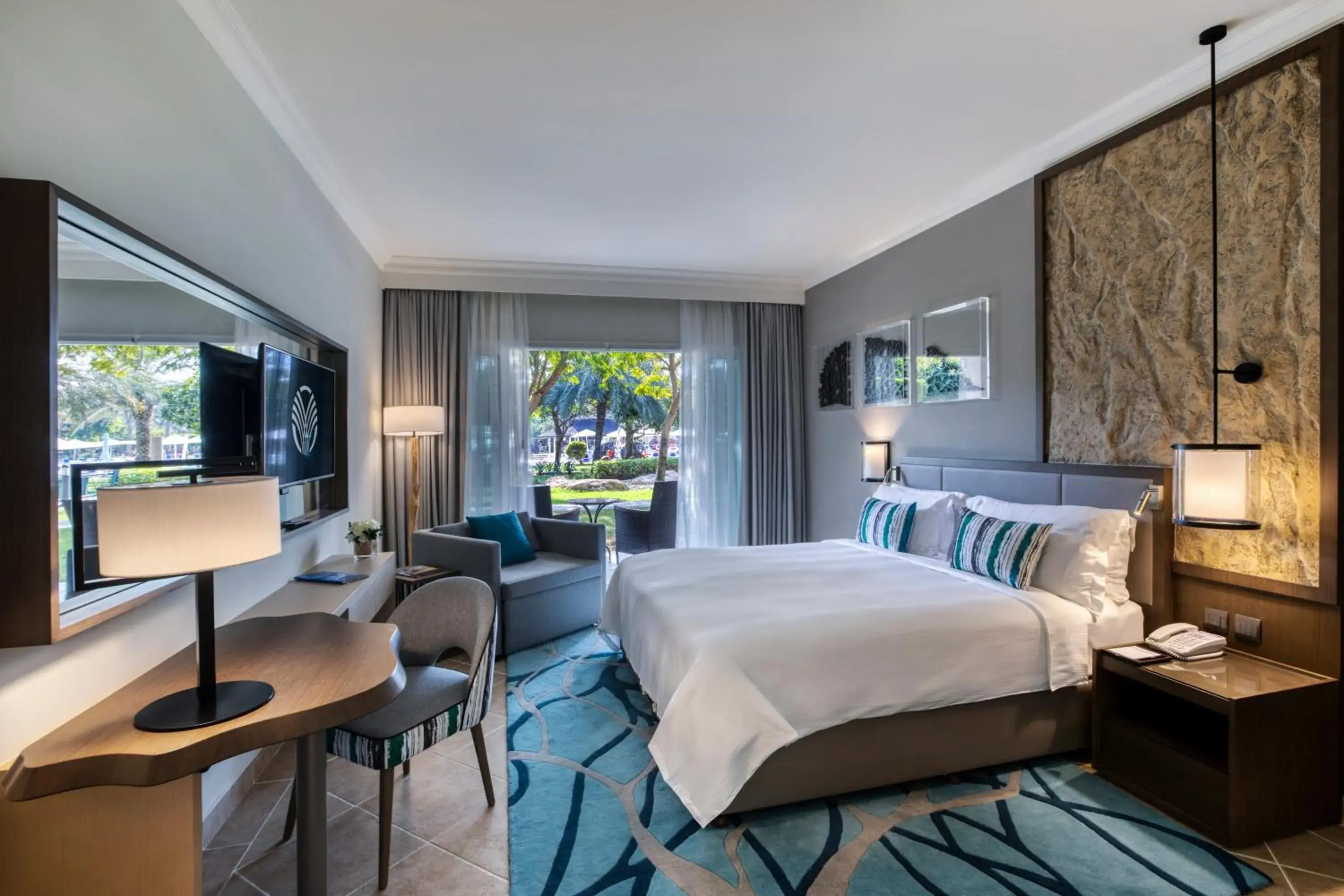 Garden View Room with Terrace - King Bed in Fujairah Rotana Resort & Spa - Al Aqah Beach Garden View Room with Terrace - King Bed in Fujairah Rotana Resort & Spa - Al Aqah Beach