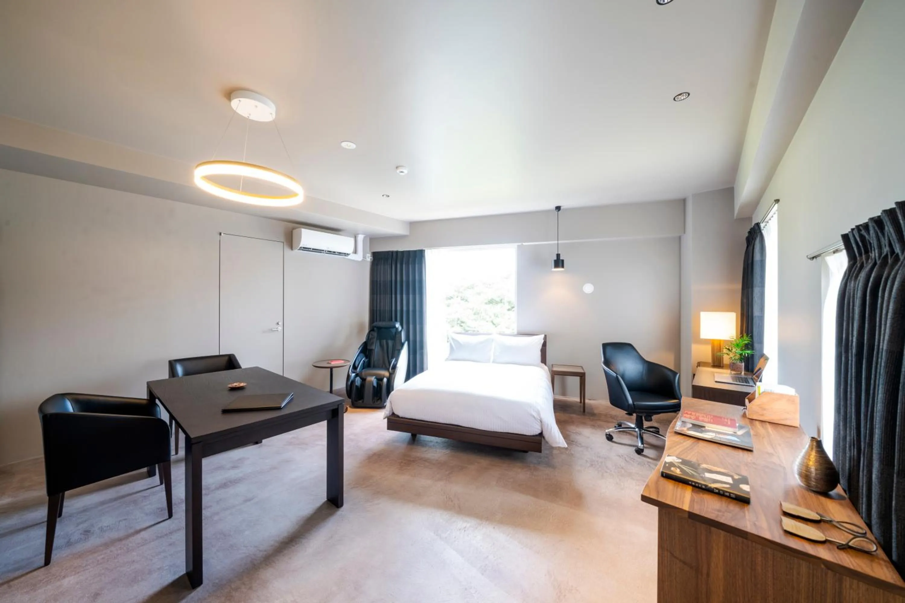 Bed in HOTEL PETIT SUITE SOGENJI ISHIMON