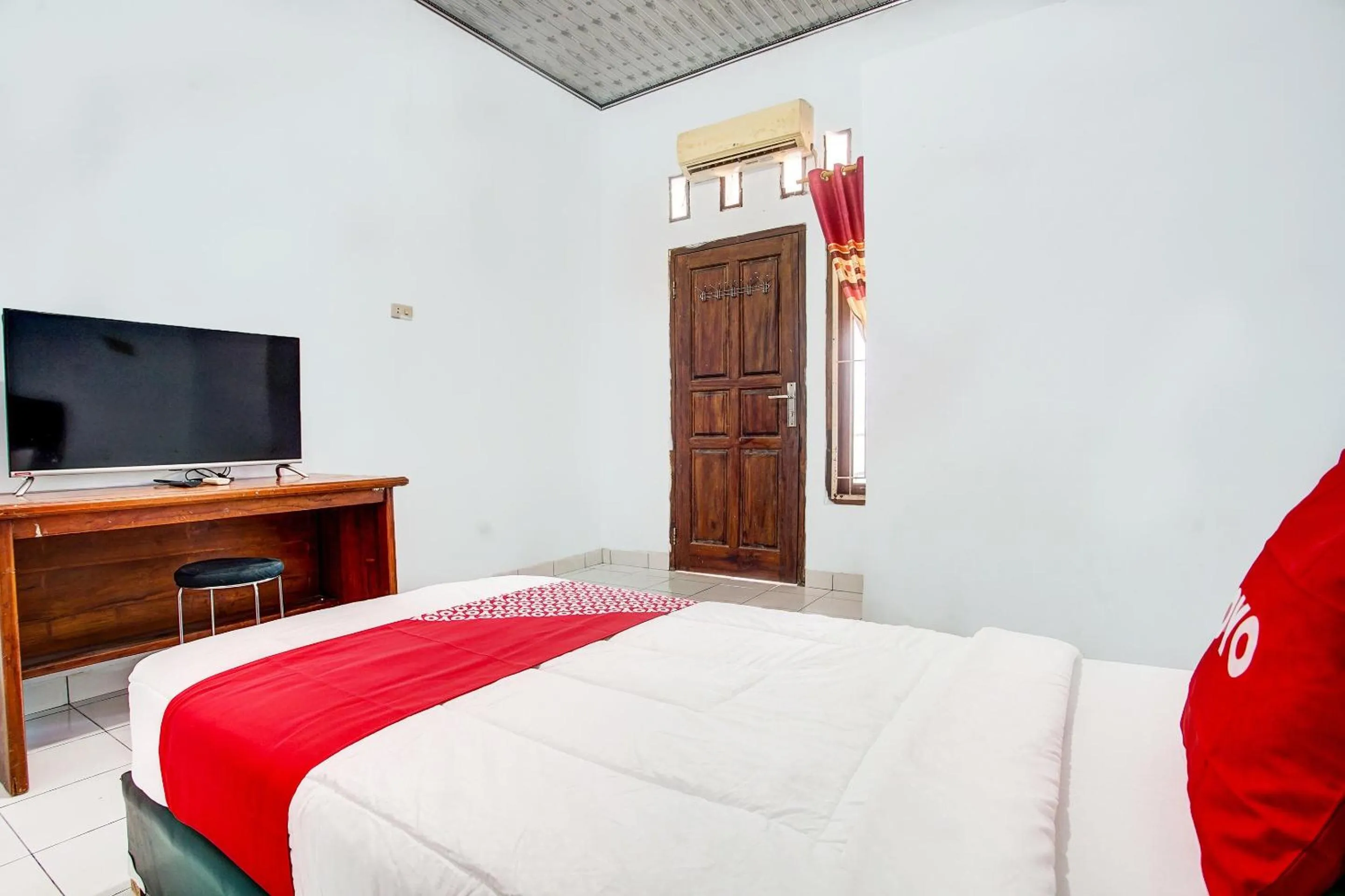 Bedroom in OYO 3994 Wisma Amalia