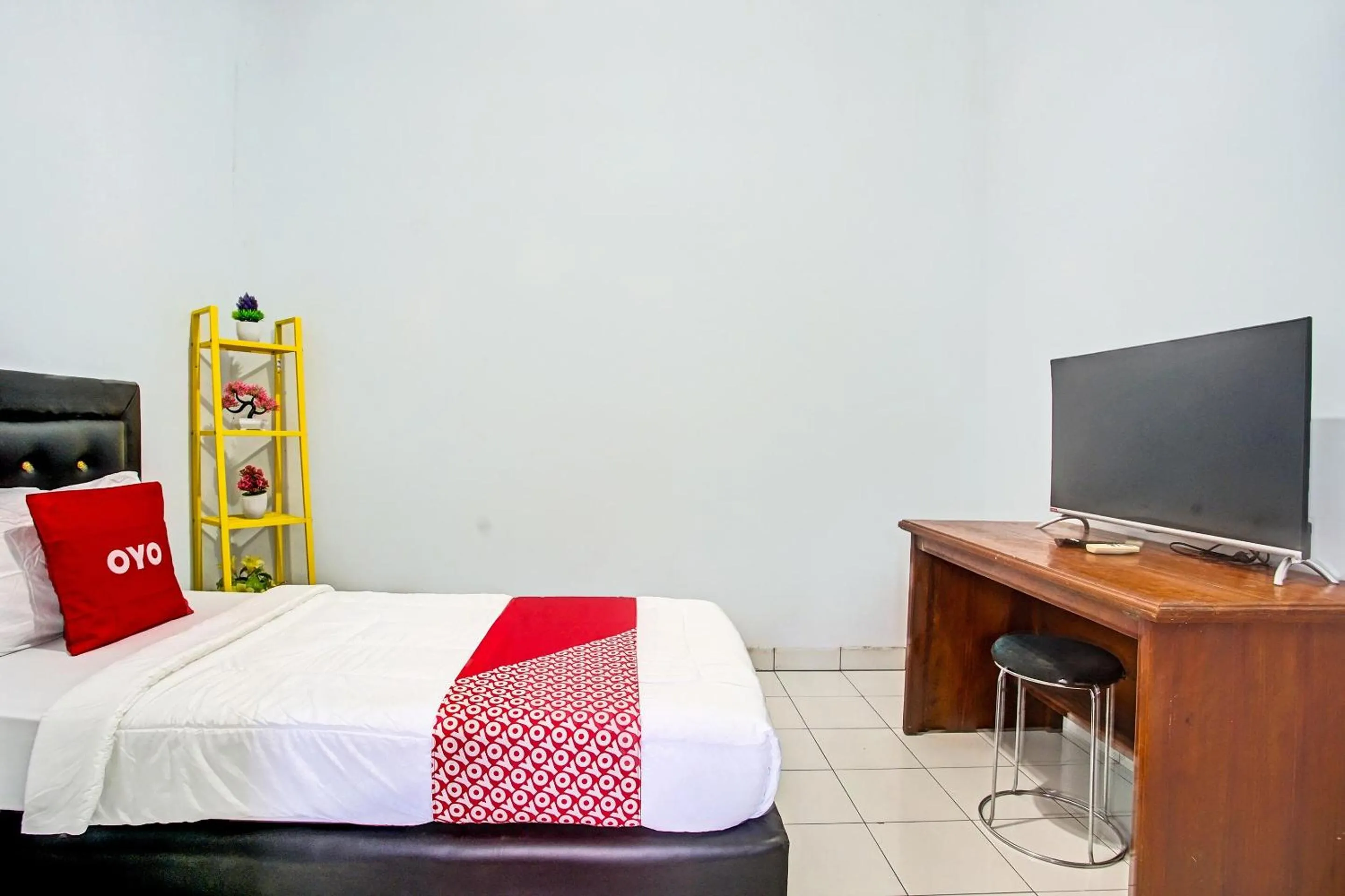 Bedroom in OYO 3994 Wisma Amalia