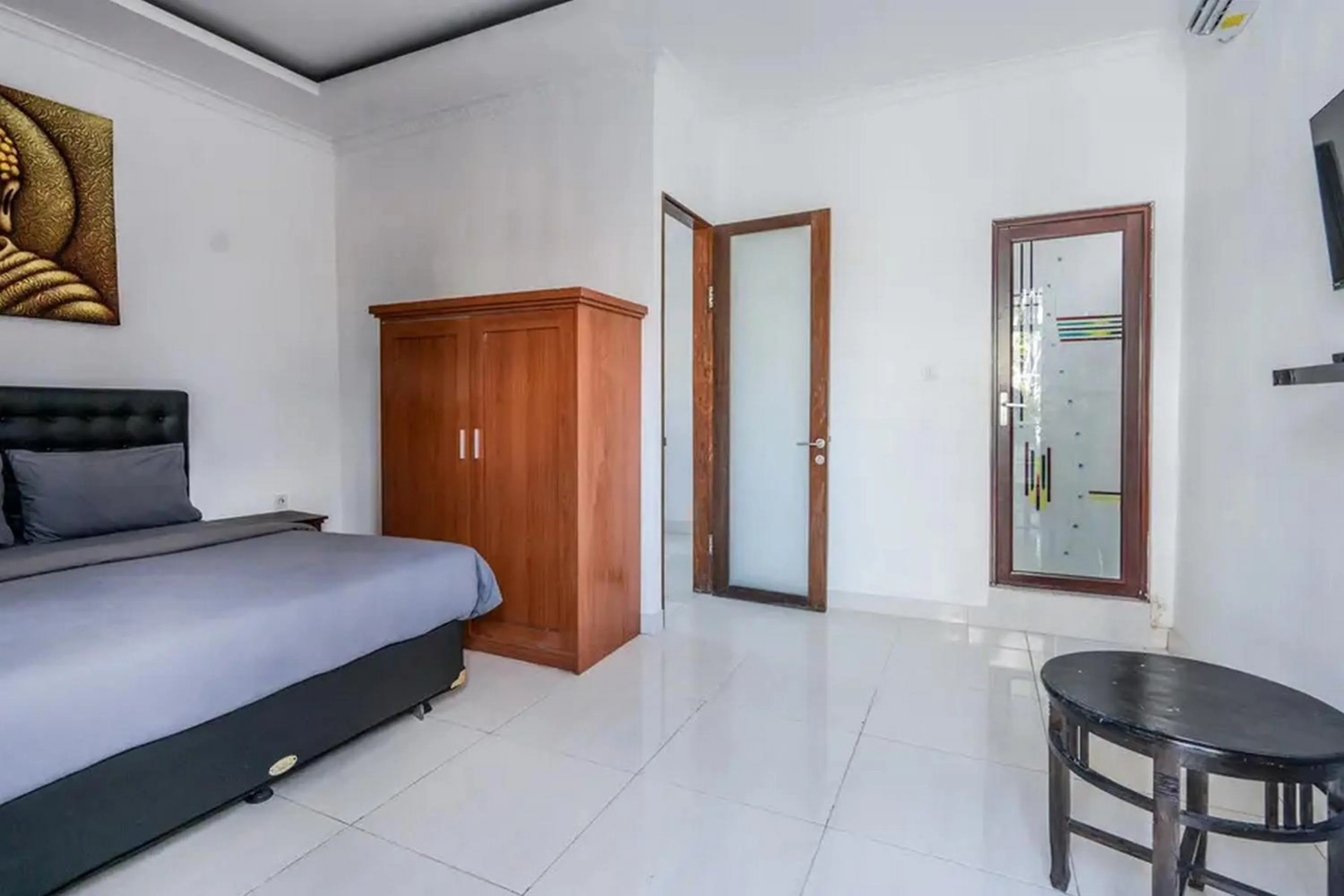 Bedroom, Bed in Ceria Guesthouse Seminyak Mitra RedDoorz