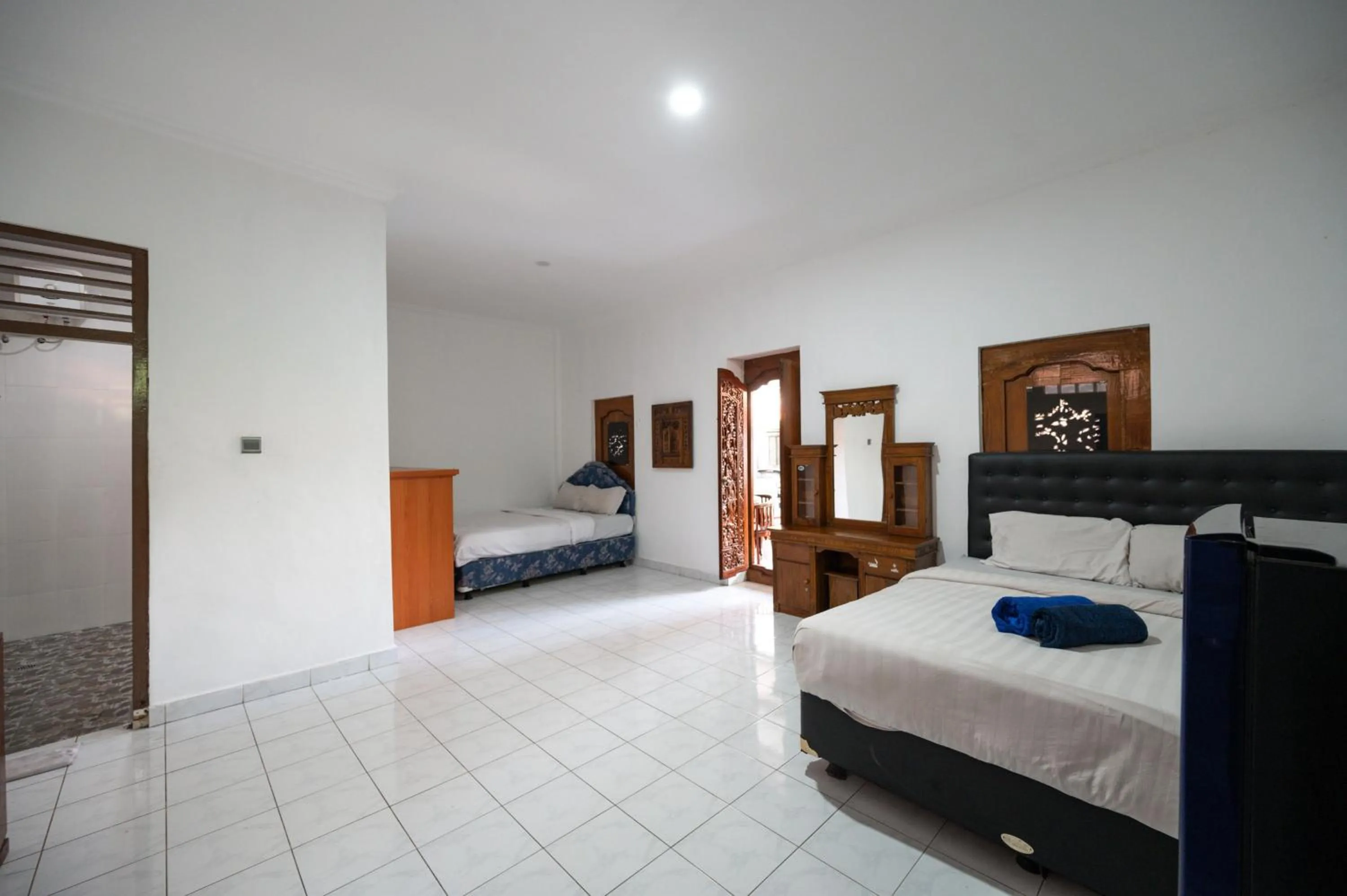 Bedroom, Bed in Ceria Guesthouse Seminyak Mitra RedDoorz