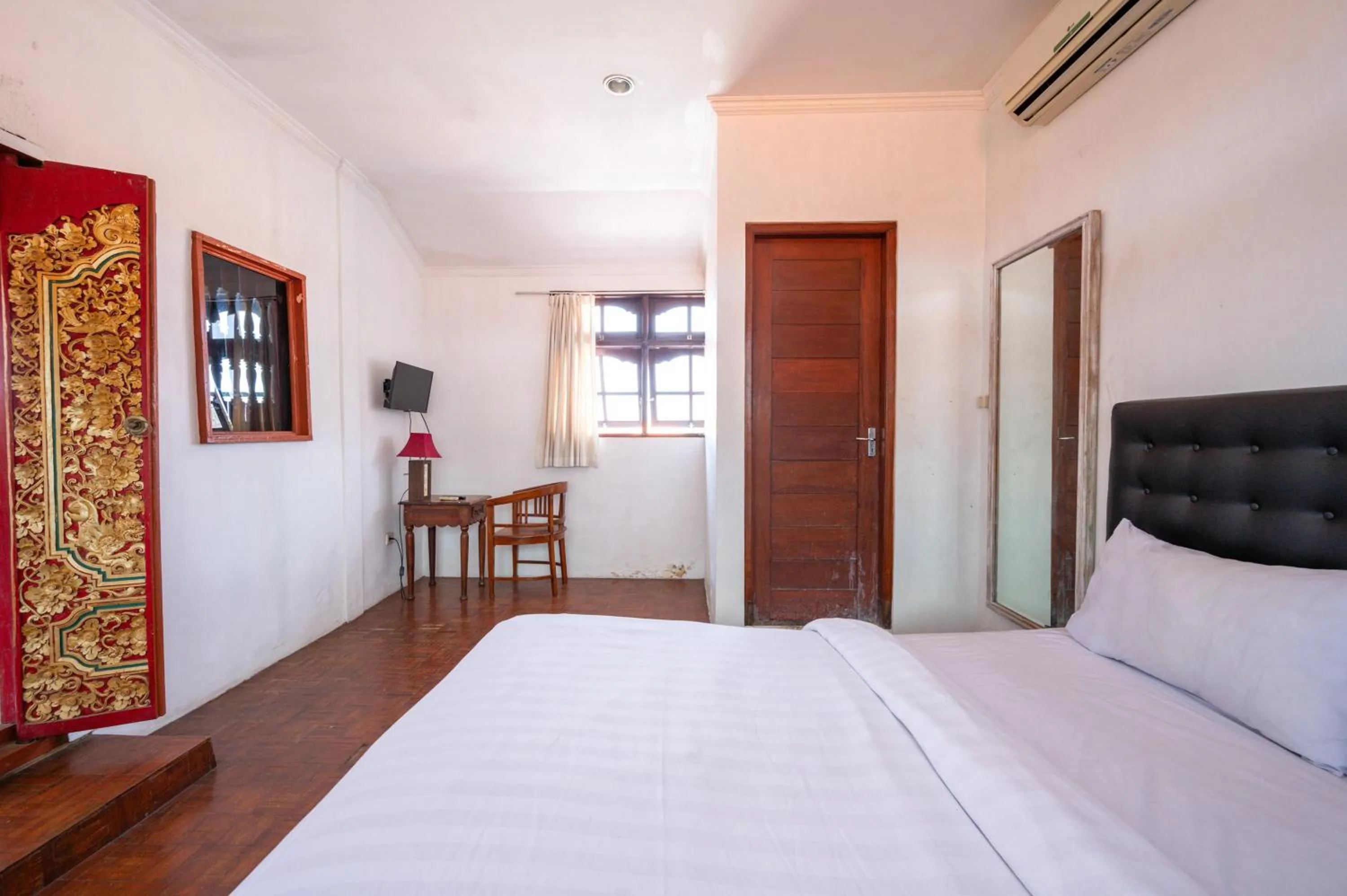 Bedroom, Bed in Ceria Guesthouse Seminyak Mitra RedDoorz
