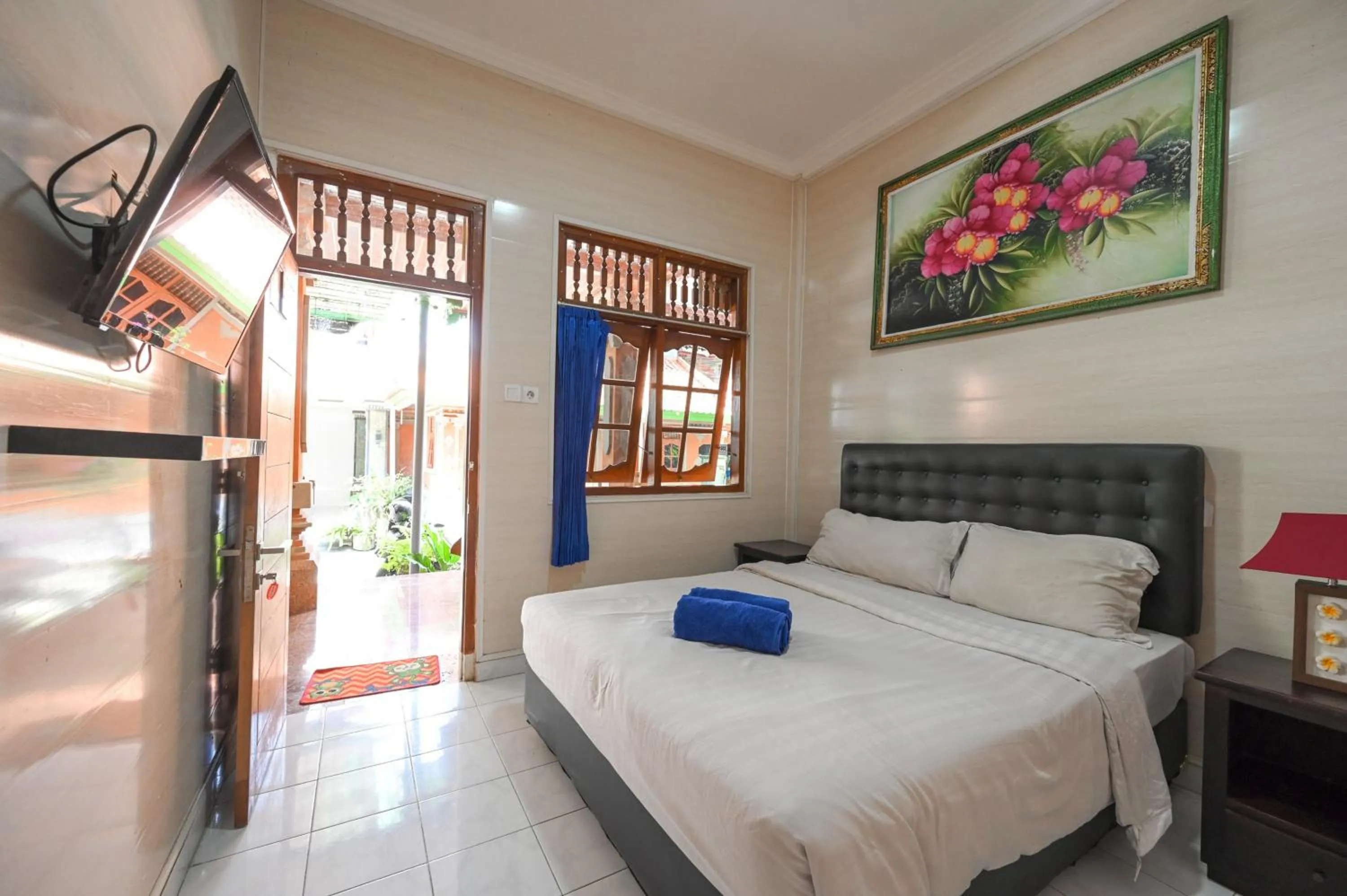 Bedroom, Bed in Ceria Guesthouse Seminyak Mitra RedDoorz