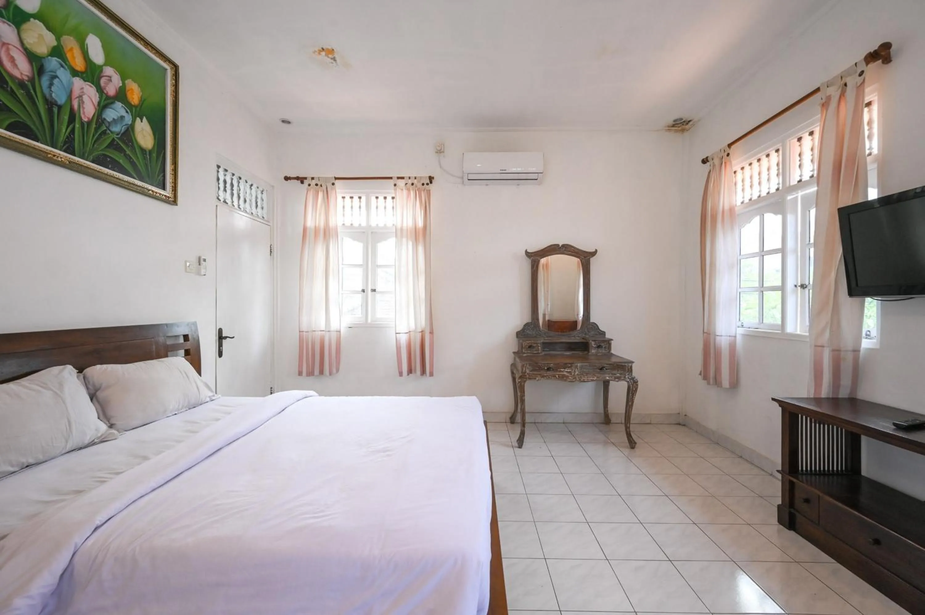 Bedroom, Bed in Ceria Guesthouse Seminyak Mitra RedDoorz