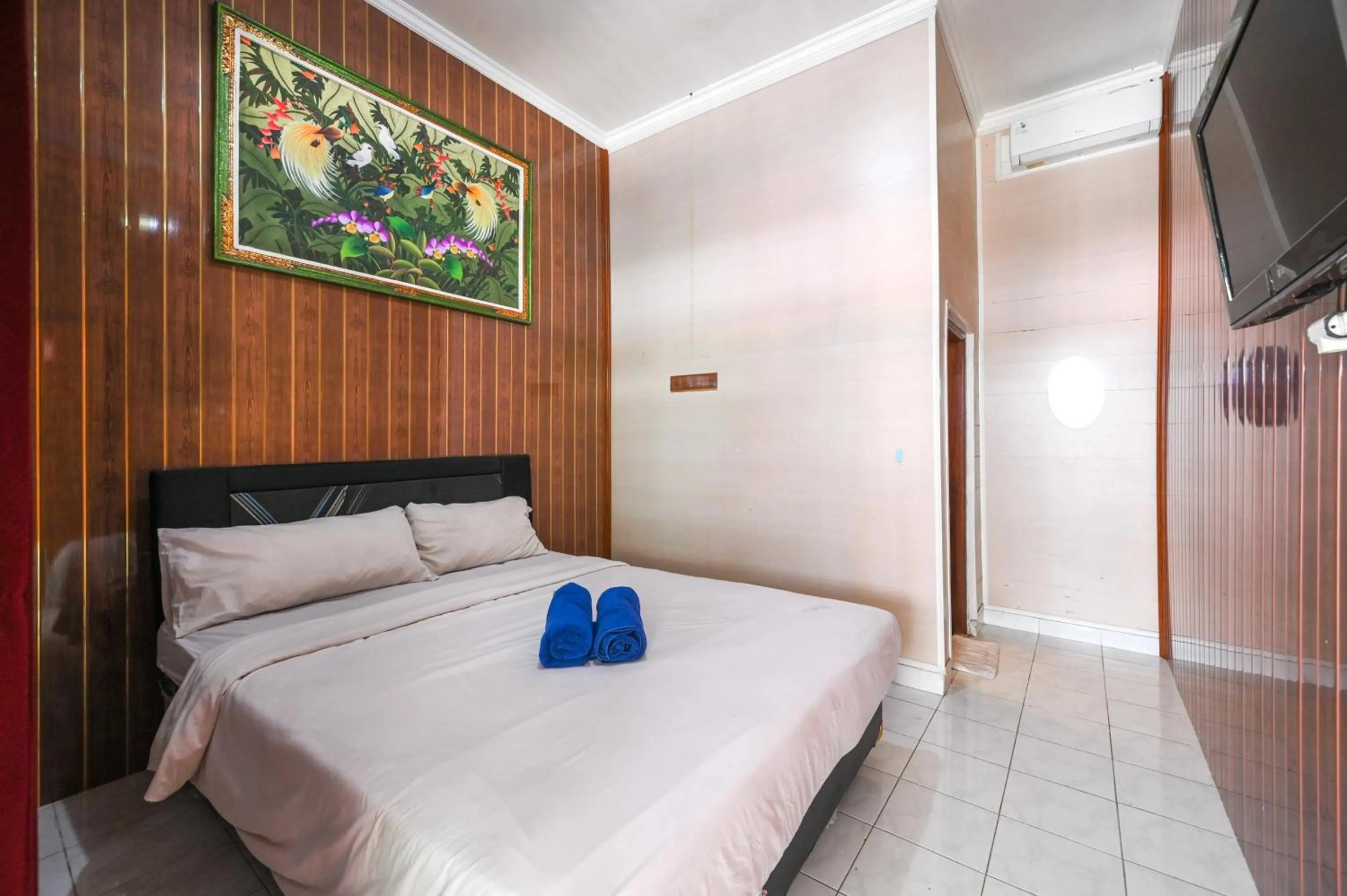 Bedroom, Bed in Ceria Guesthouse Seminyak Mitra RedDoorz