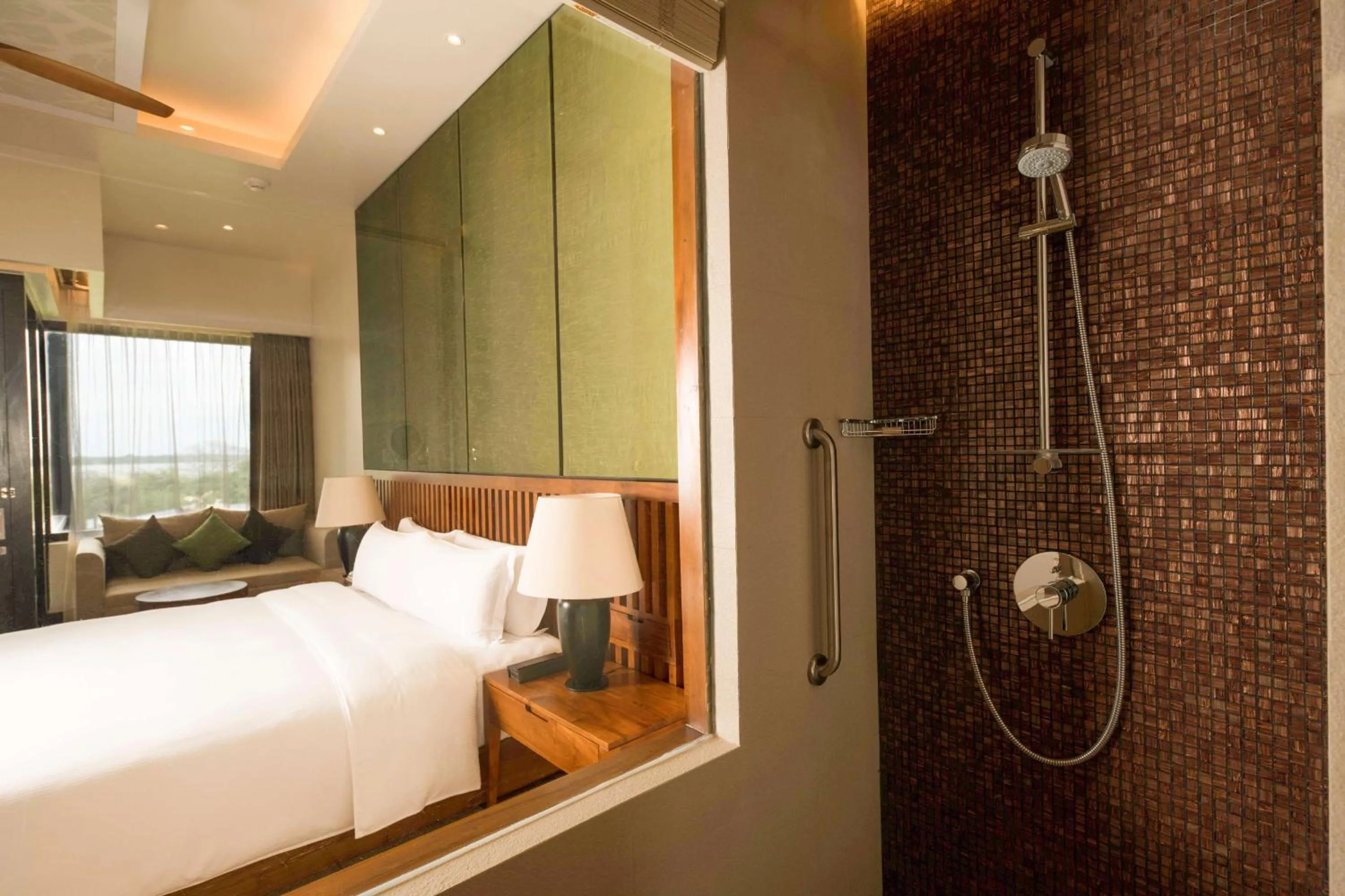 Bathroom, Bed in DoubleTree by Hilton Weerawila Rajawarna Resort