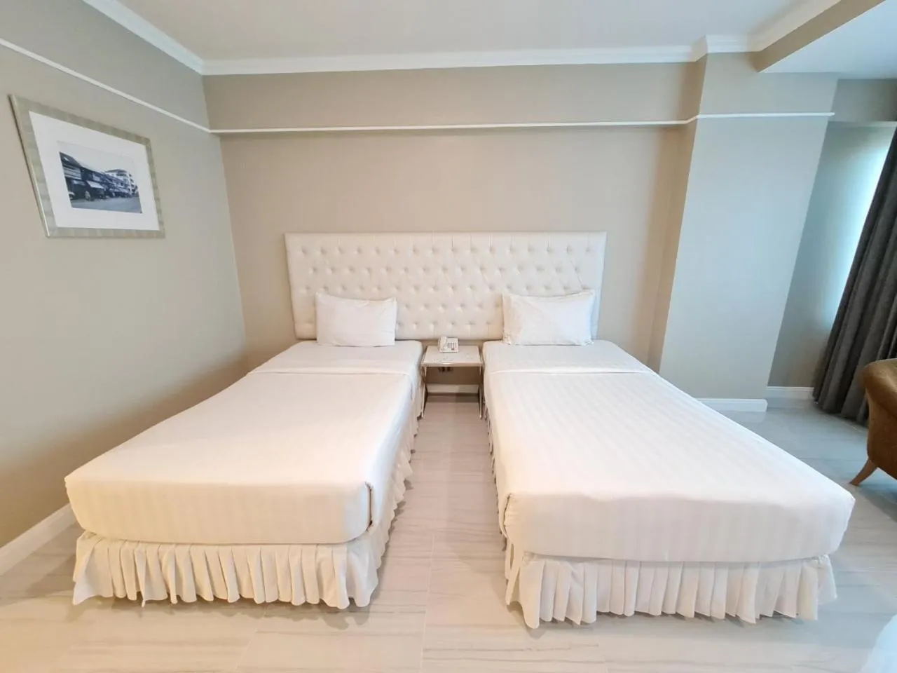 Bed in Chaisaeng Palace Hotel