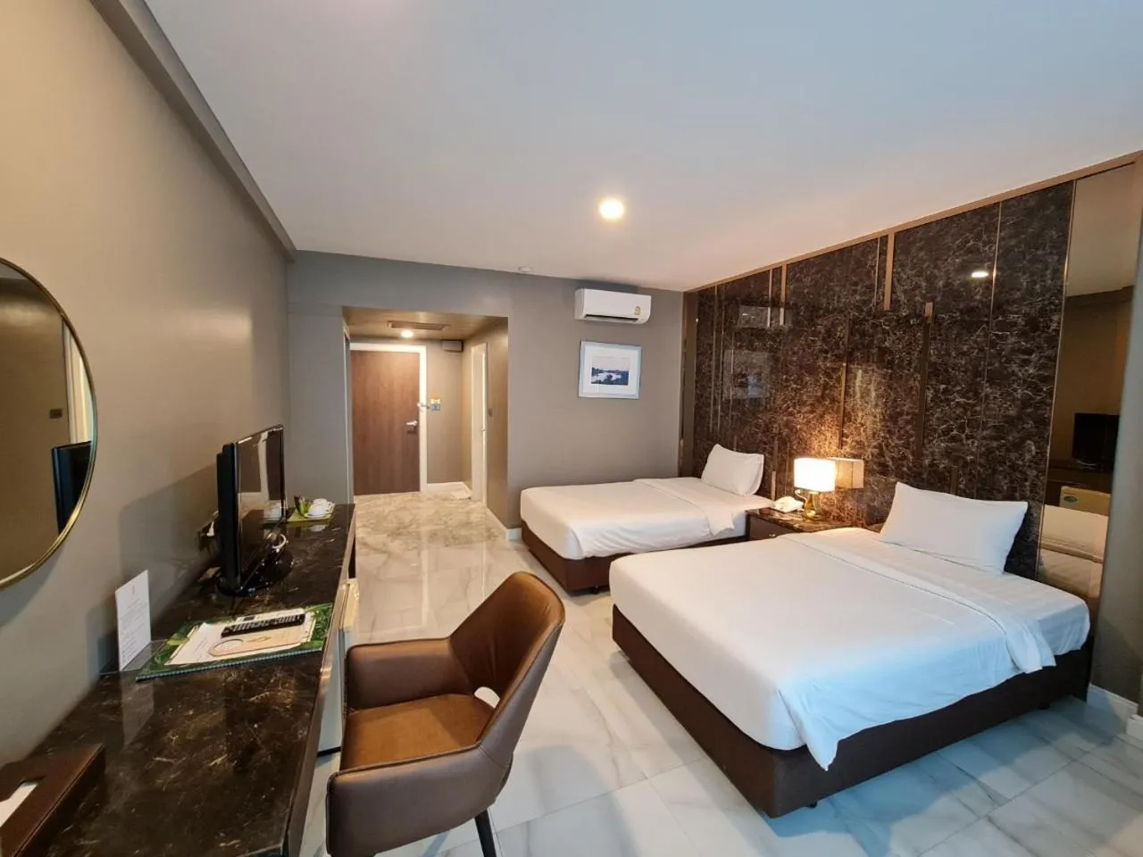 Bed in Chaisaeng Palace Hotel