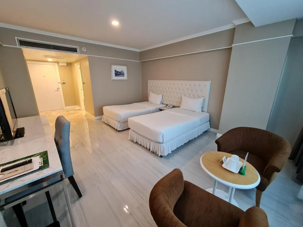 Bed in Chaisaeng Palace Hotel