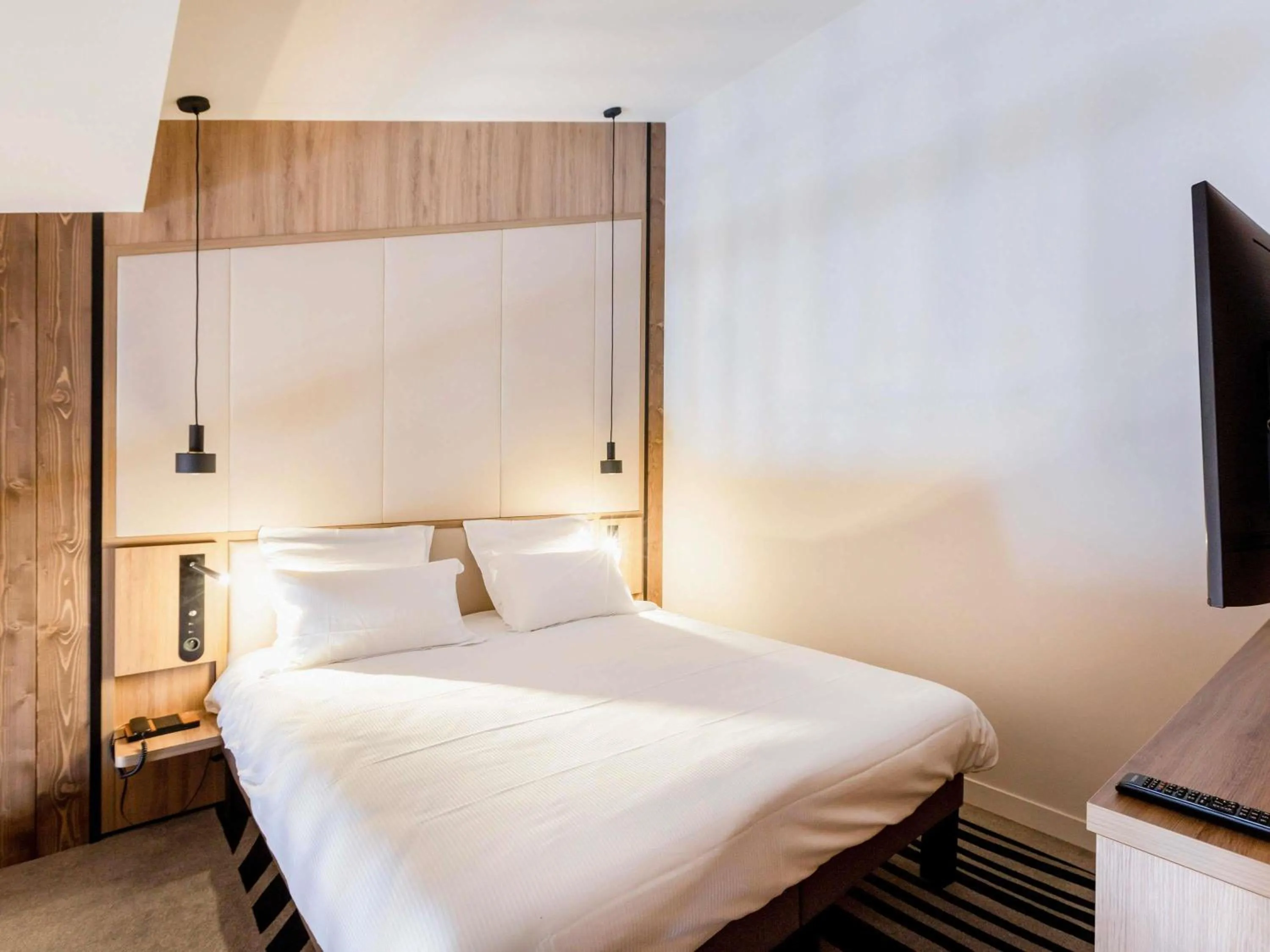 Bedroom, Bed in Novotel Megève Mont-Blanc