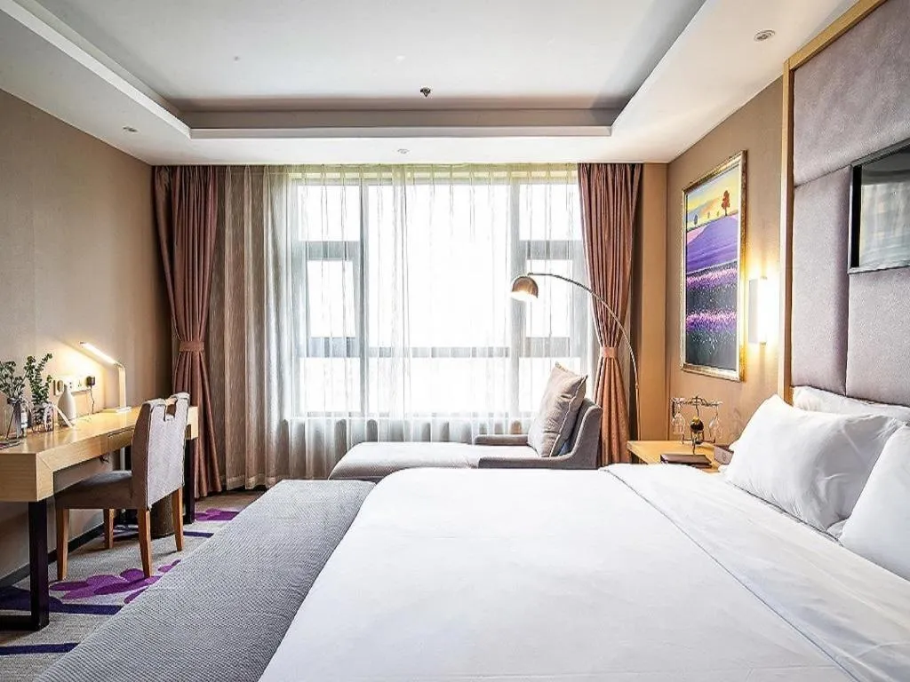 Bed in Lavande Hotel Leshan High-speed Railway Station Wanda Plaza