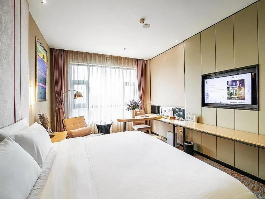 Bed in Lavande Hotel Leshan High-speed Railway Station Wanda Plaza