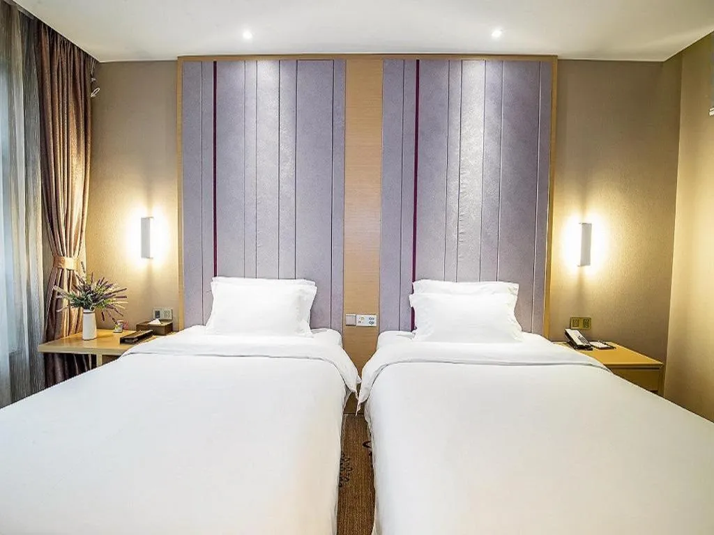 Bed in Lavande Hotel Leshan High-speed Railway Station Wanda Plaza