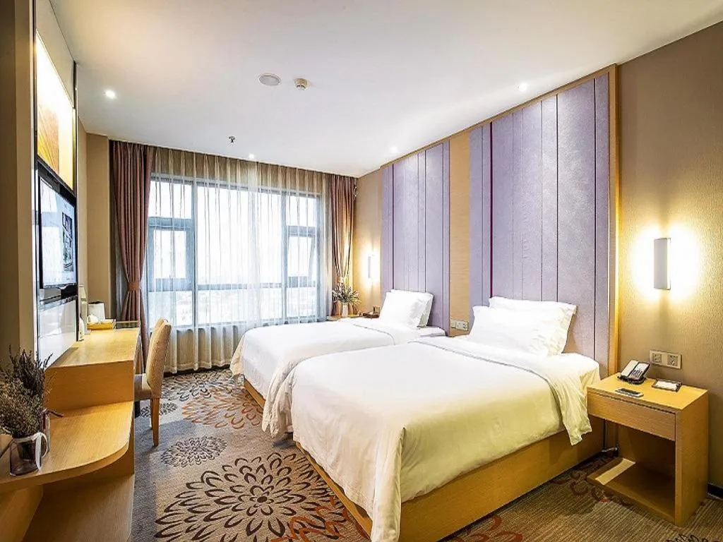 Bed in Lavande Hotel Leshan High-speed Railway Station Wanda Plaza