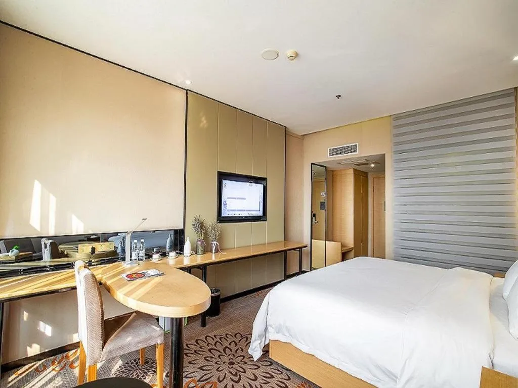 Bed in Lavande Hotel Leshan High-speed Railway Station Wanda Plaza