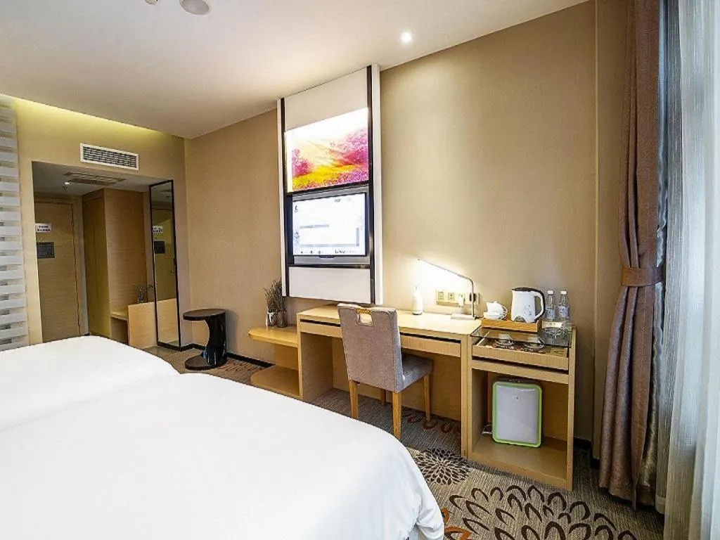 Bed in Lavande Hotel Leshan High-speed Railway Station Wanda Plaza