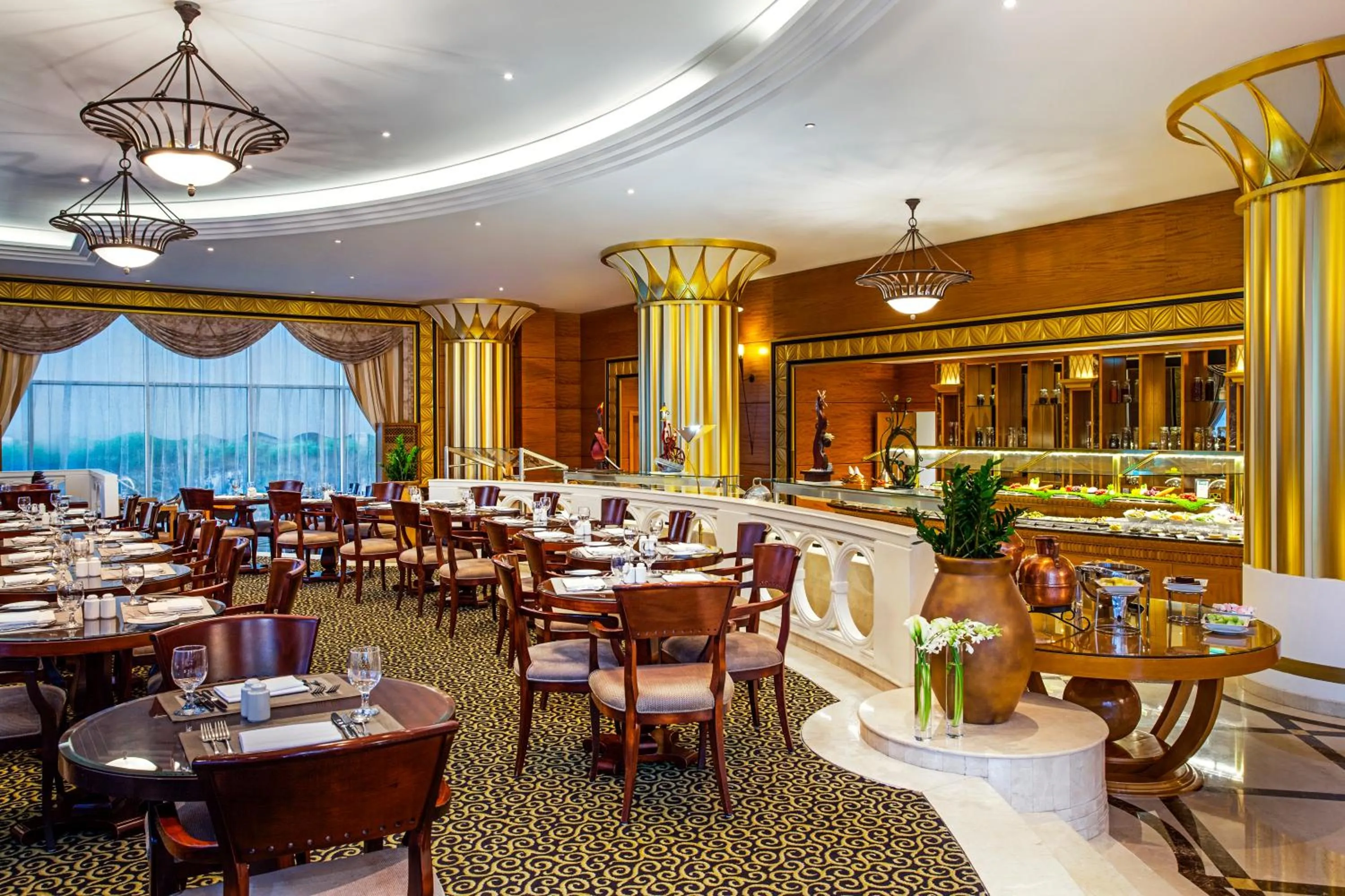 Dining area in Corniche Hotel Abu Dhabi