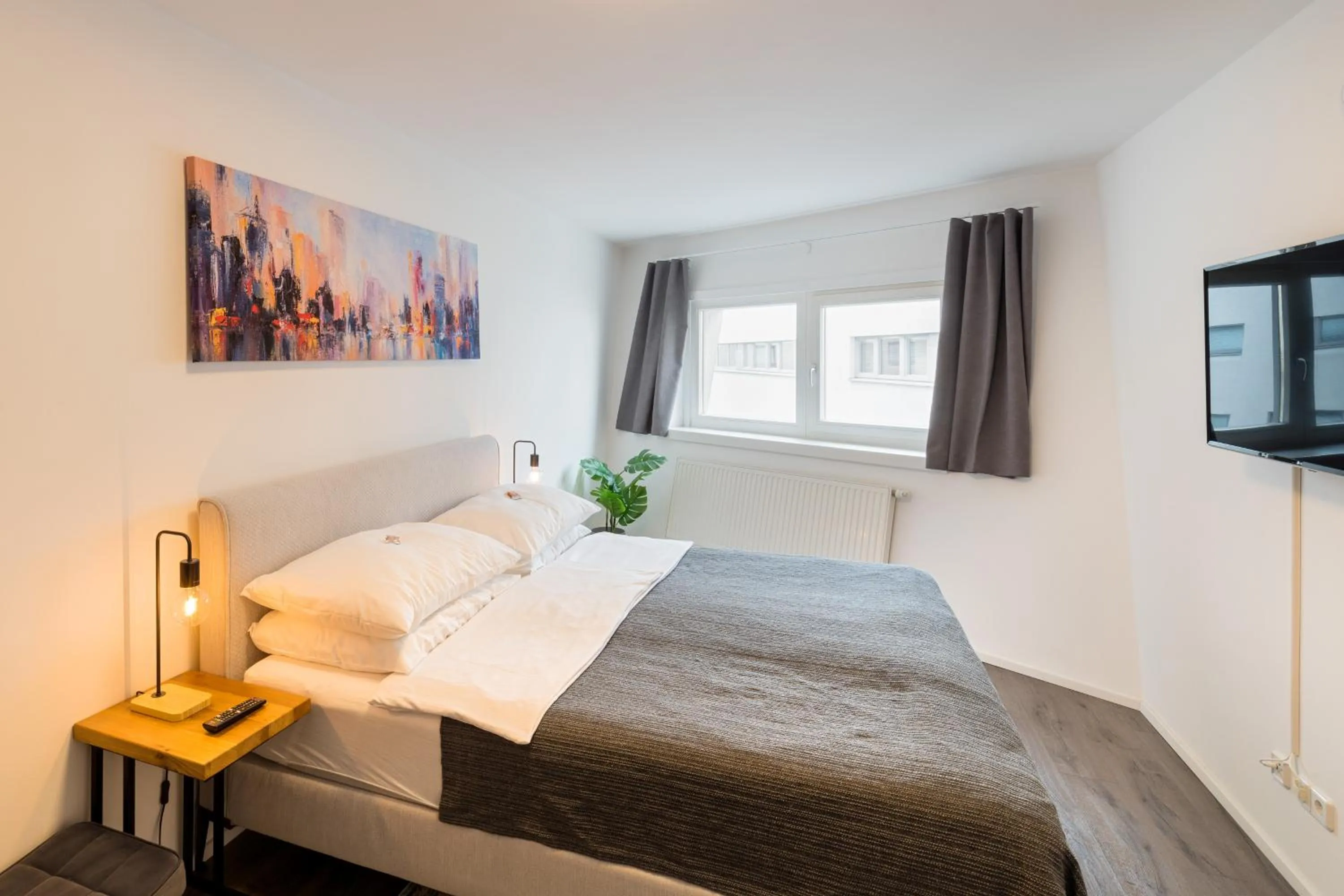 Bed in URBAN ISLAND I Riverside Apartments