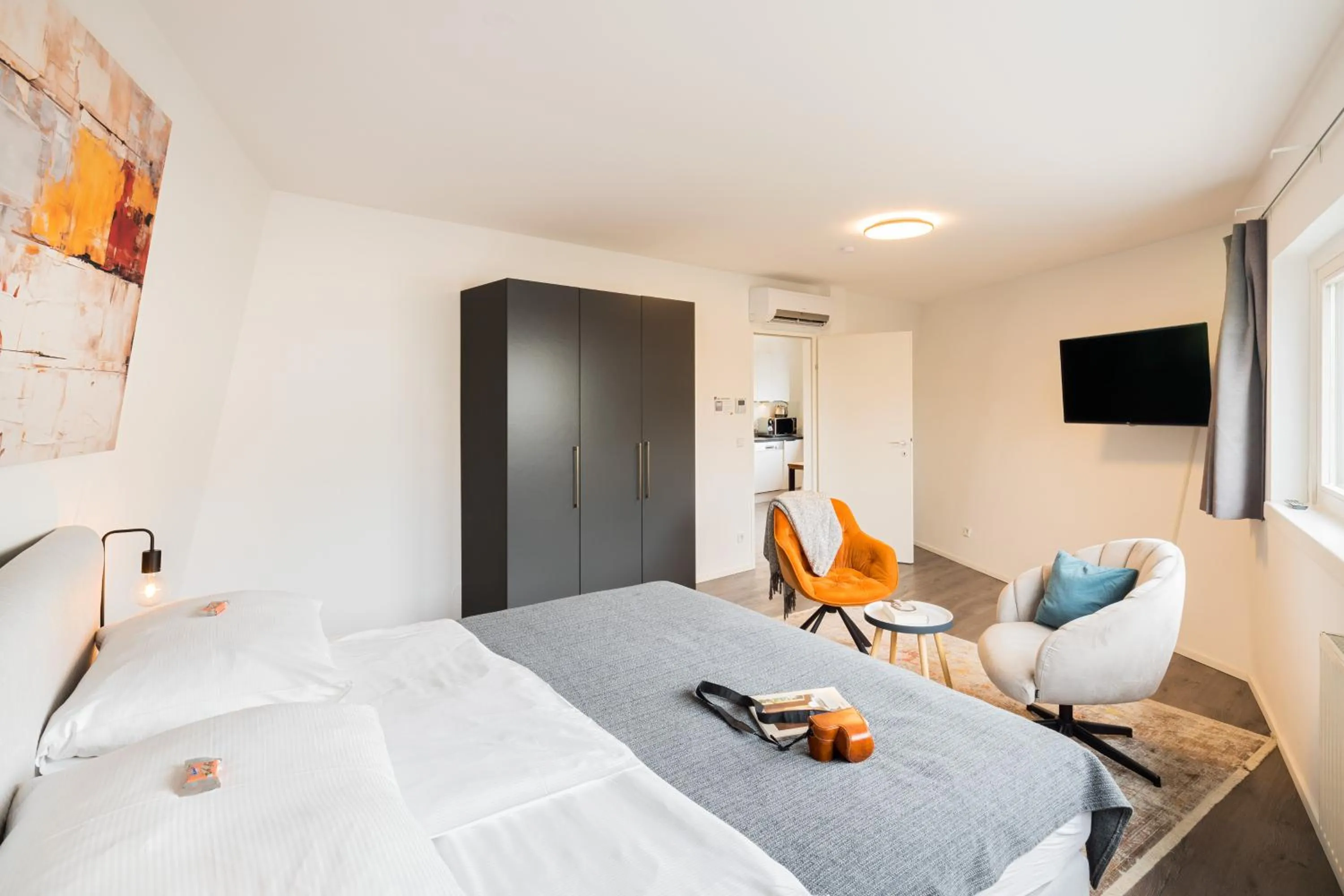 Bed in URBAN ISLAND I Riverside Apartments