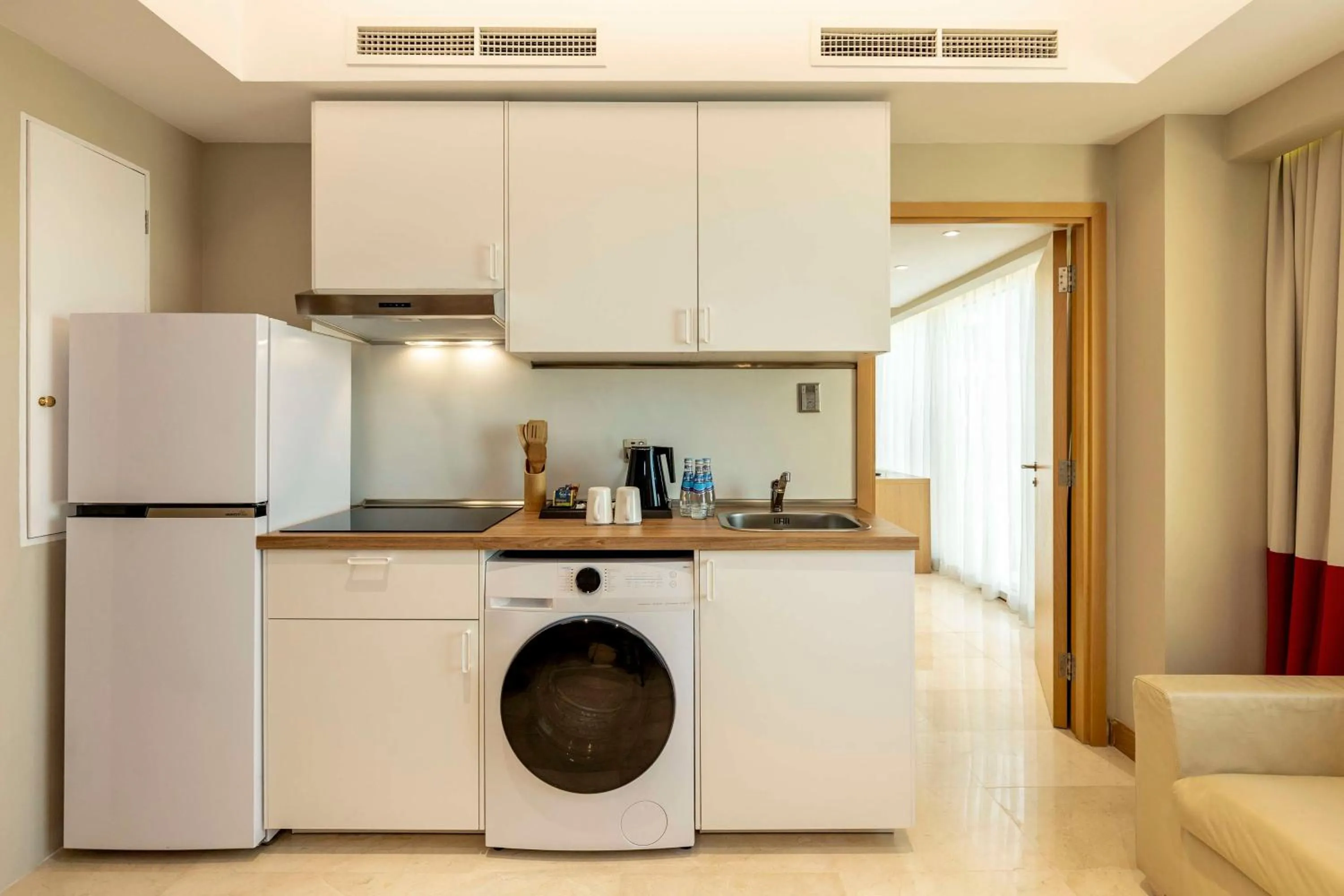 Kitchen or kitchenette in Radisson Blu Hotel, Doha
