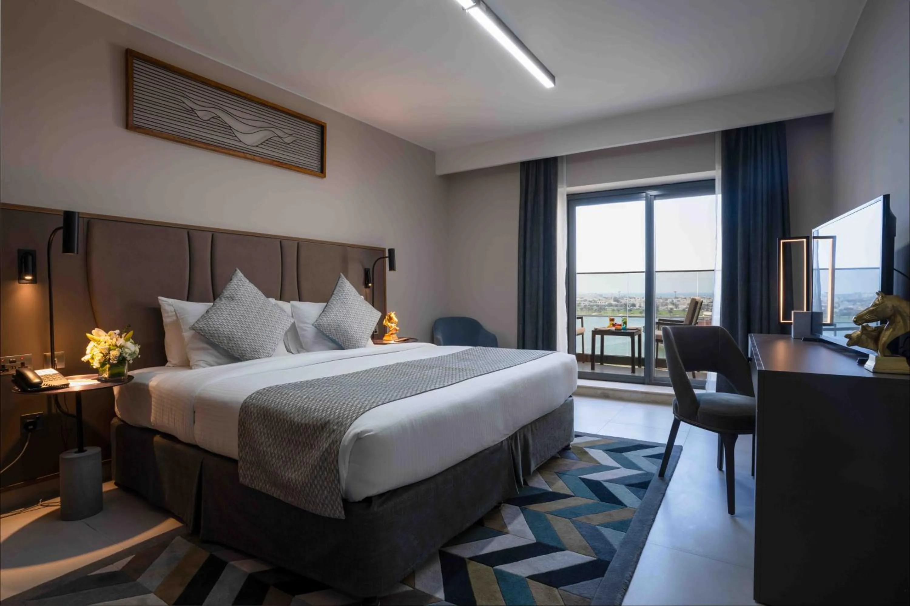 Bed in Hotel Holiday International