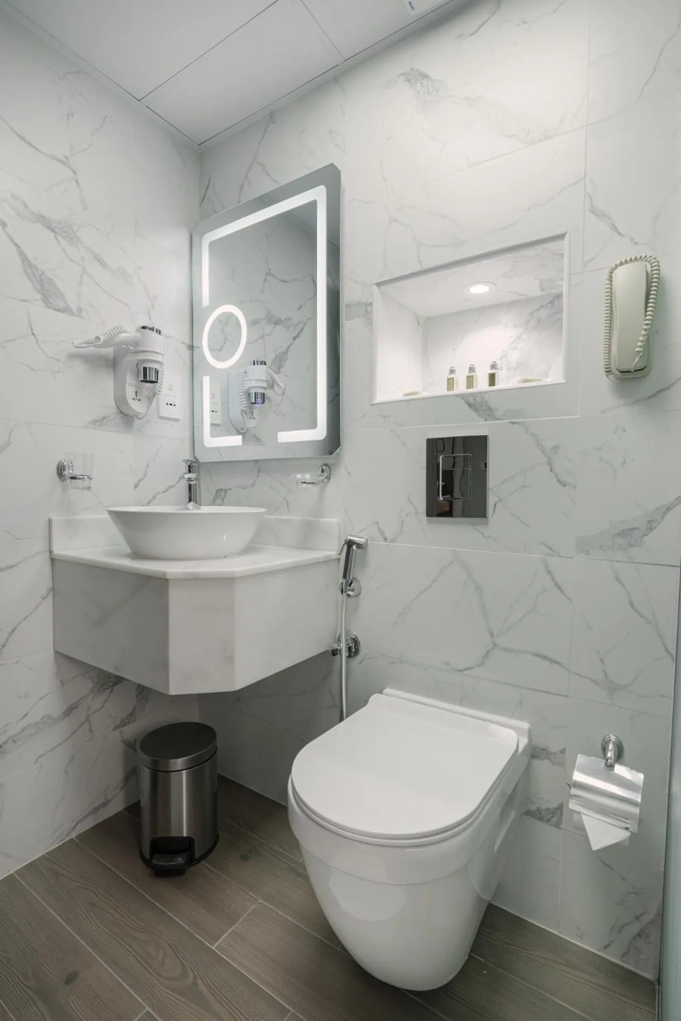 Toilet in Hotel Holiday International