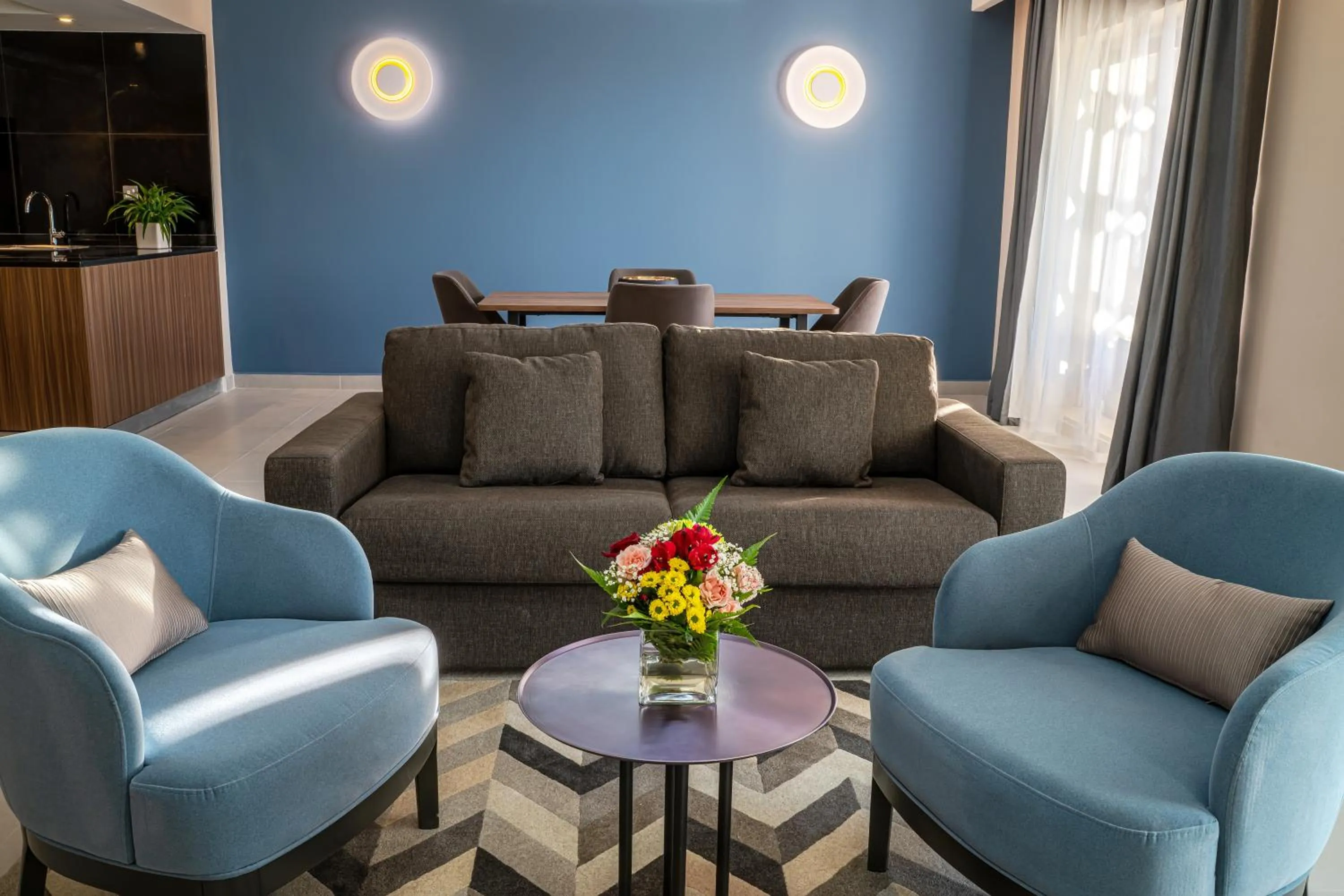 Living room in Hotel Holiday International