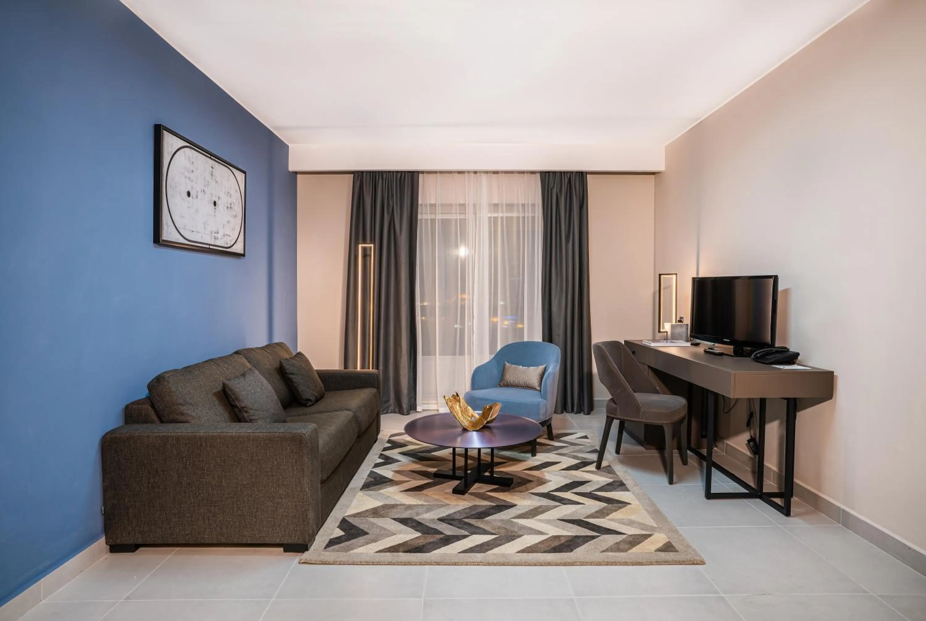 Living room in Hotel Holiday International