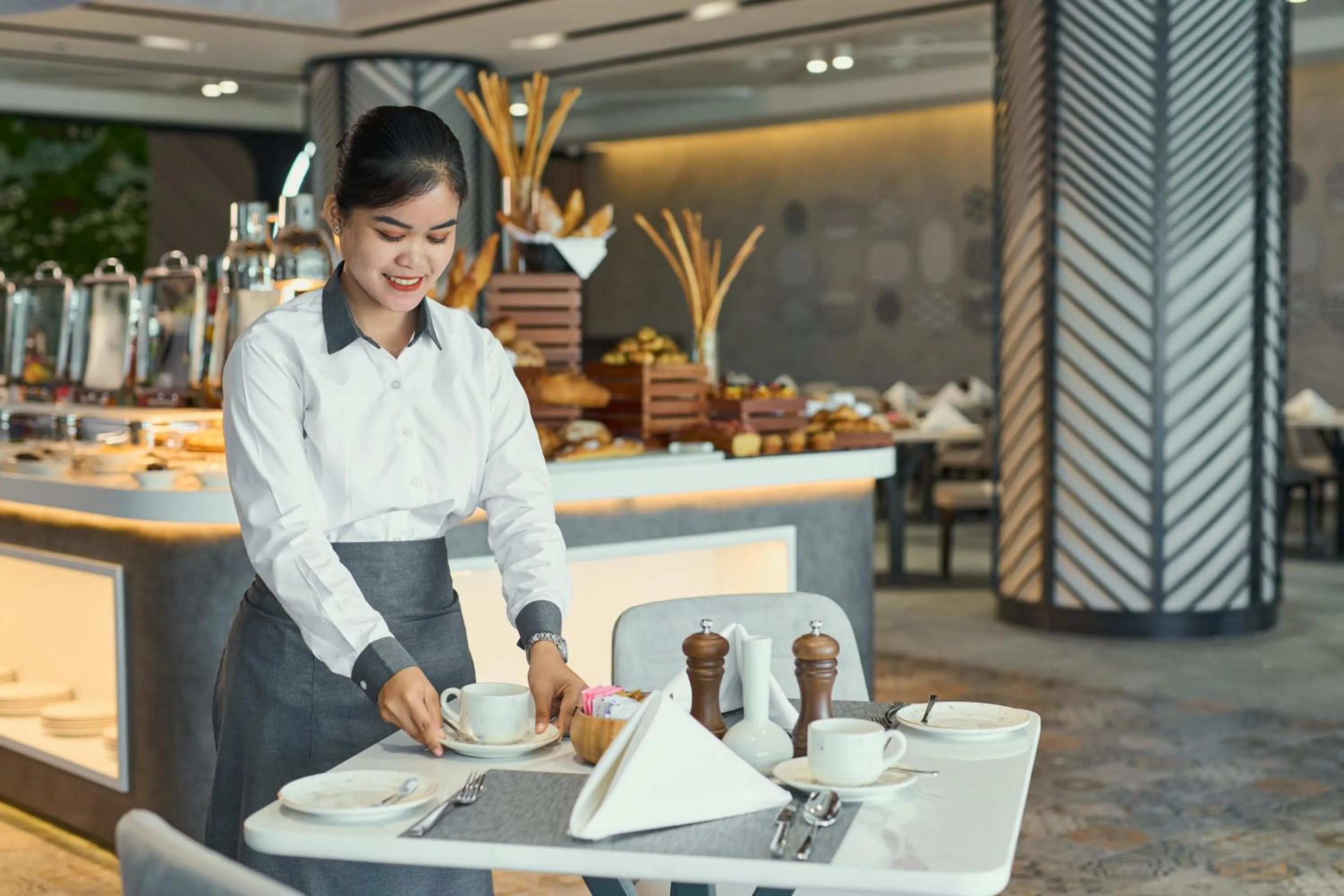 Staff in Hotel Holiday International