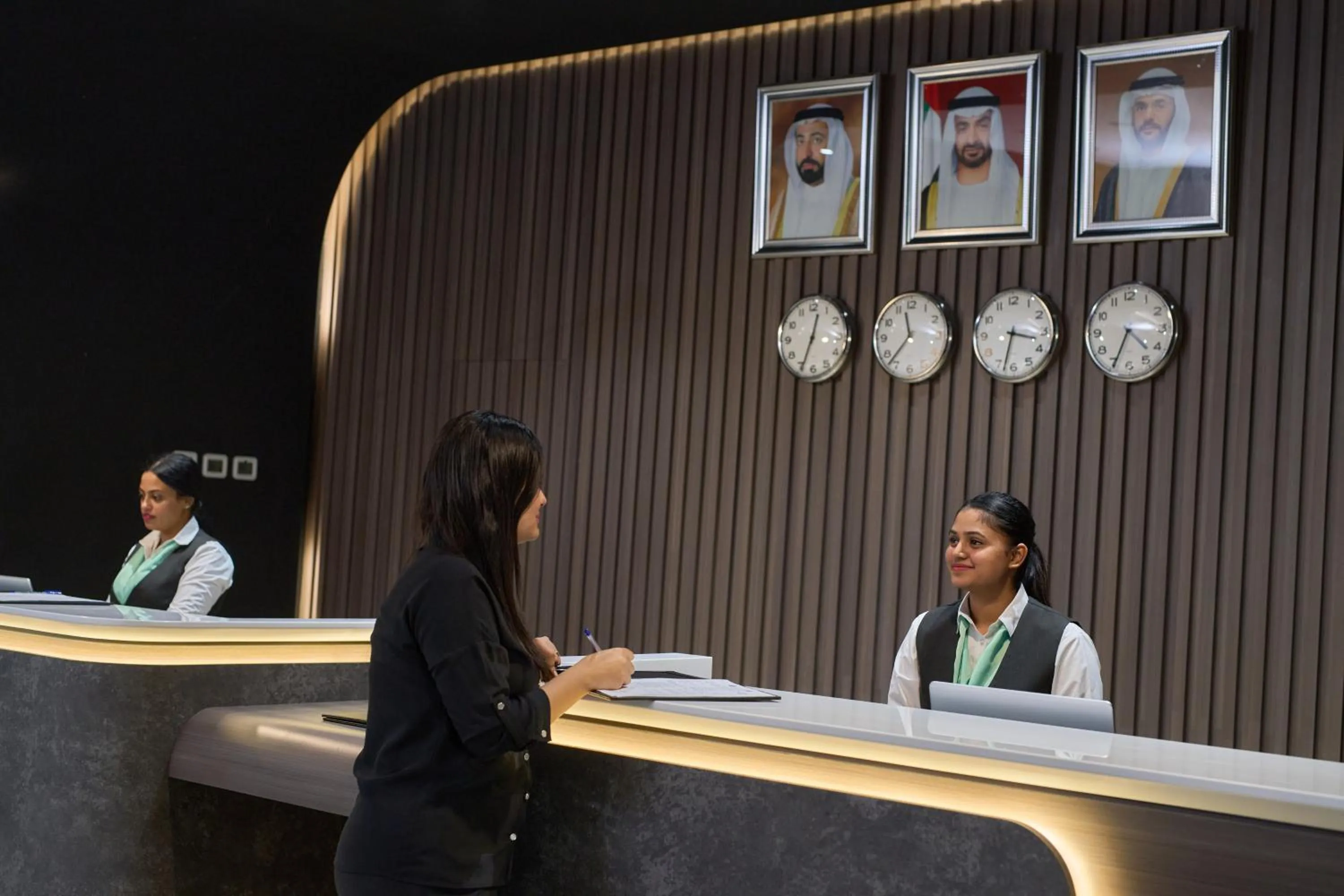 Staff in Hotel Holiday International