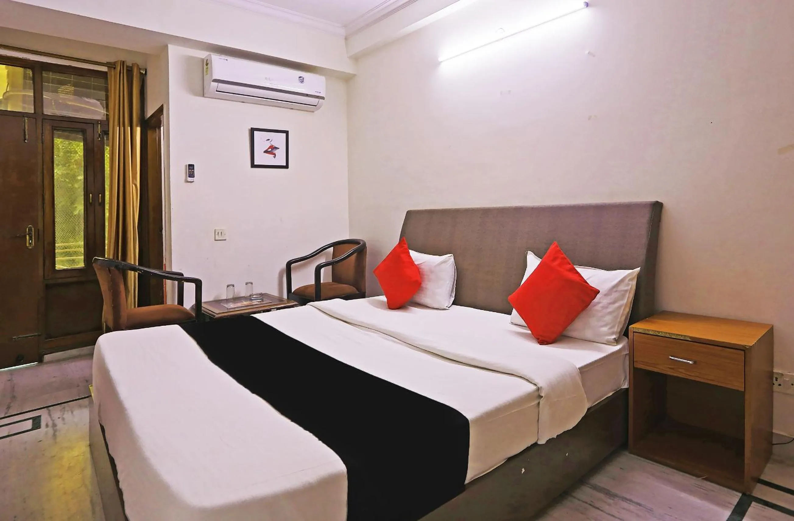 Bedroom, Bed in Capital O Perfect Inn