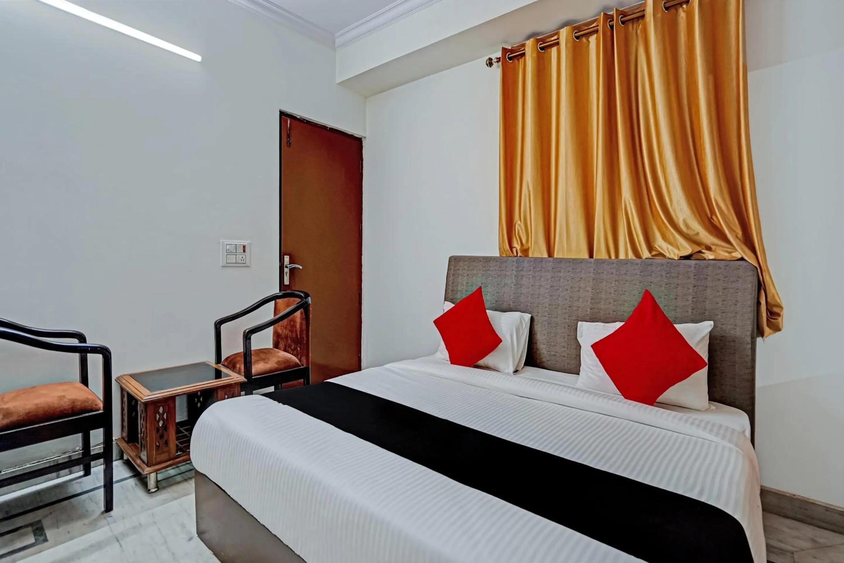 Bedroom, Bed in Capital O Perfect Inn