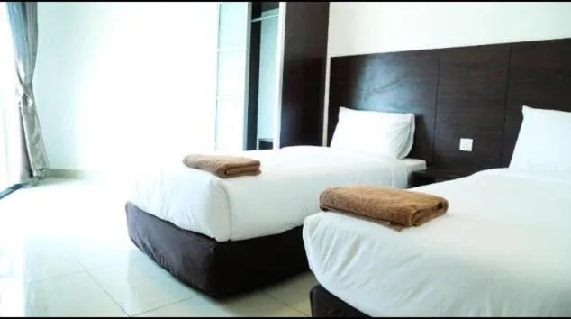Bed in Marina Heights Seaview Resort Apartment II